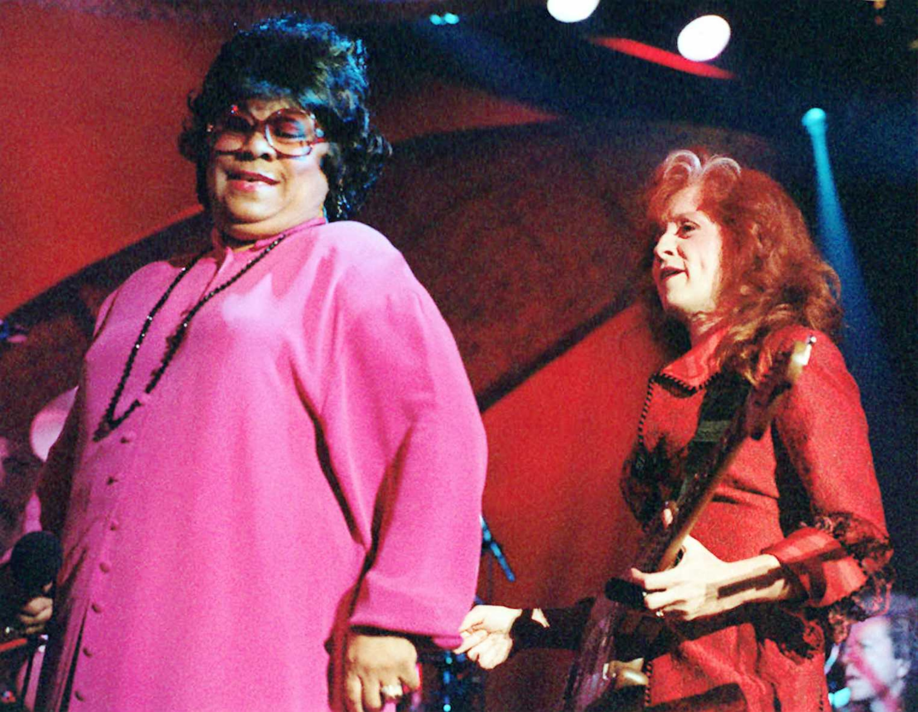 Singer Bonnie Raitt right performs with Blues legend Ruth Brown on Saturday at Chastain Park Amphitheater in 1995.