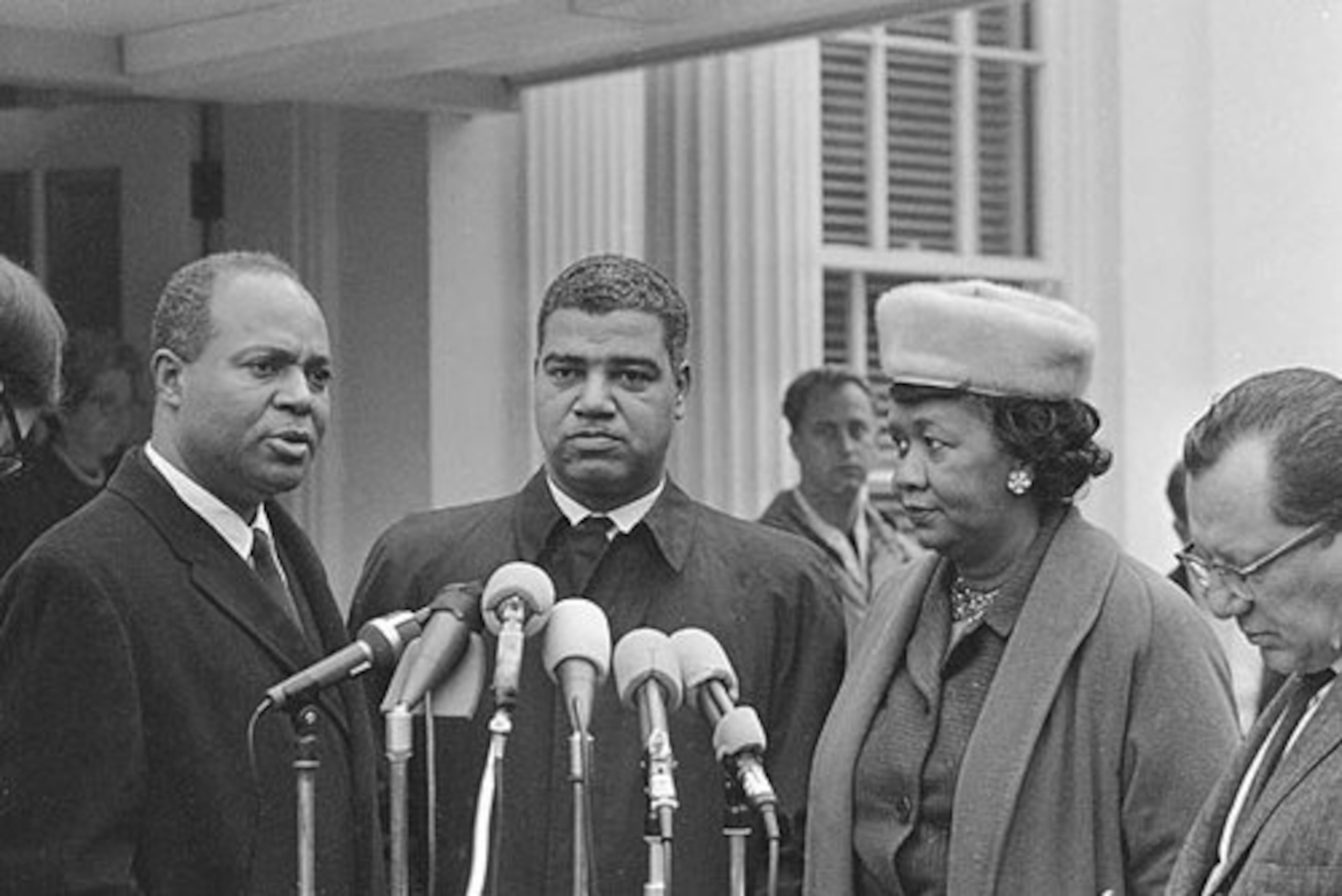 In November 1964 (from left) James Farmer, national director of the Congress of Racial Equality; Whitney M. Young, Jr., executive director of the National Urban League; Dorothy Height of the National Council of Negro Women, talk to reporters in Washington after meeting with President Lyndon Johnson. (AP file photo)