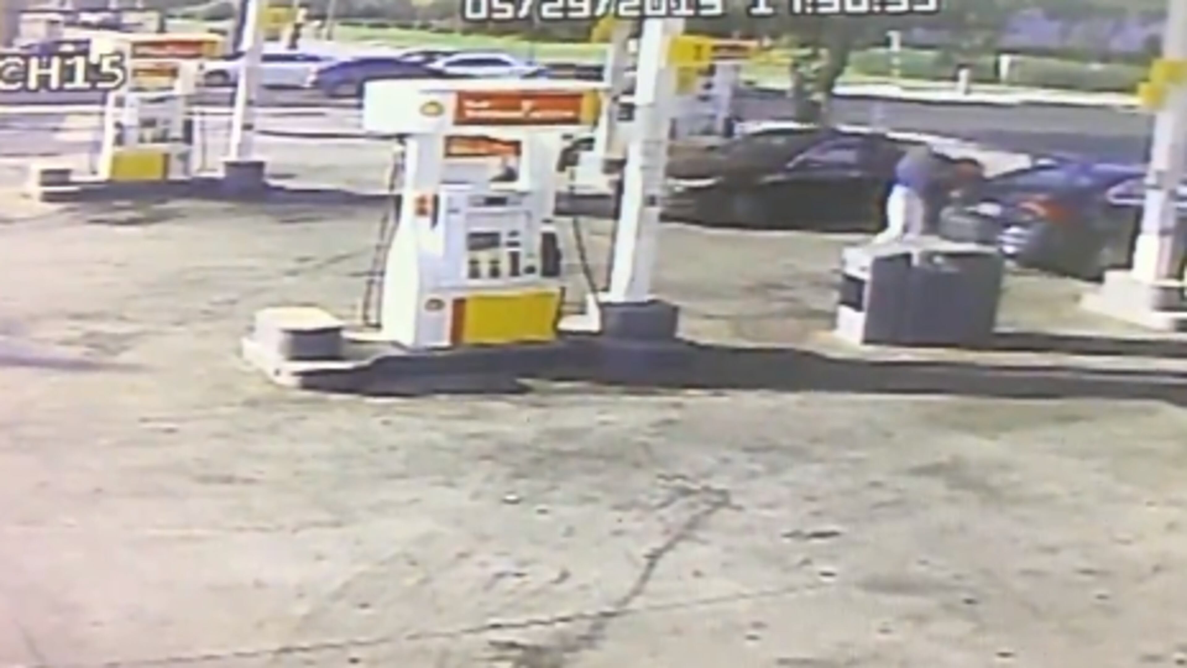 Police said four suspects robbed a woman at gunpoint at an Atlanta gas station on Wednesday.