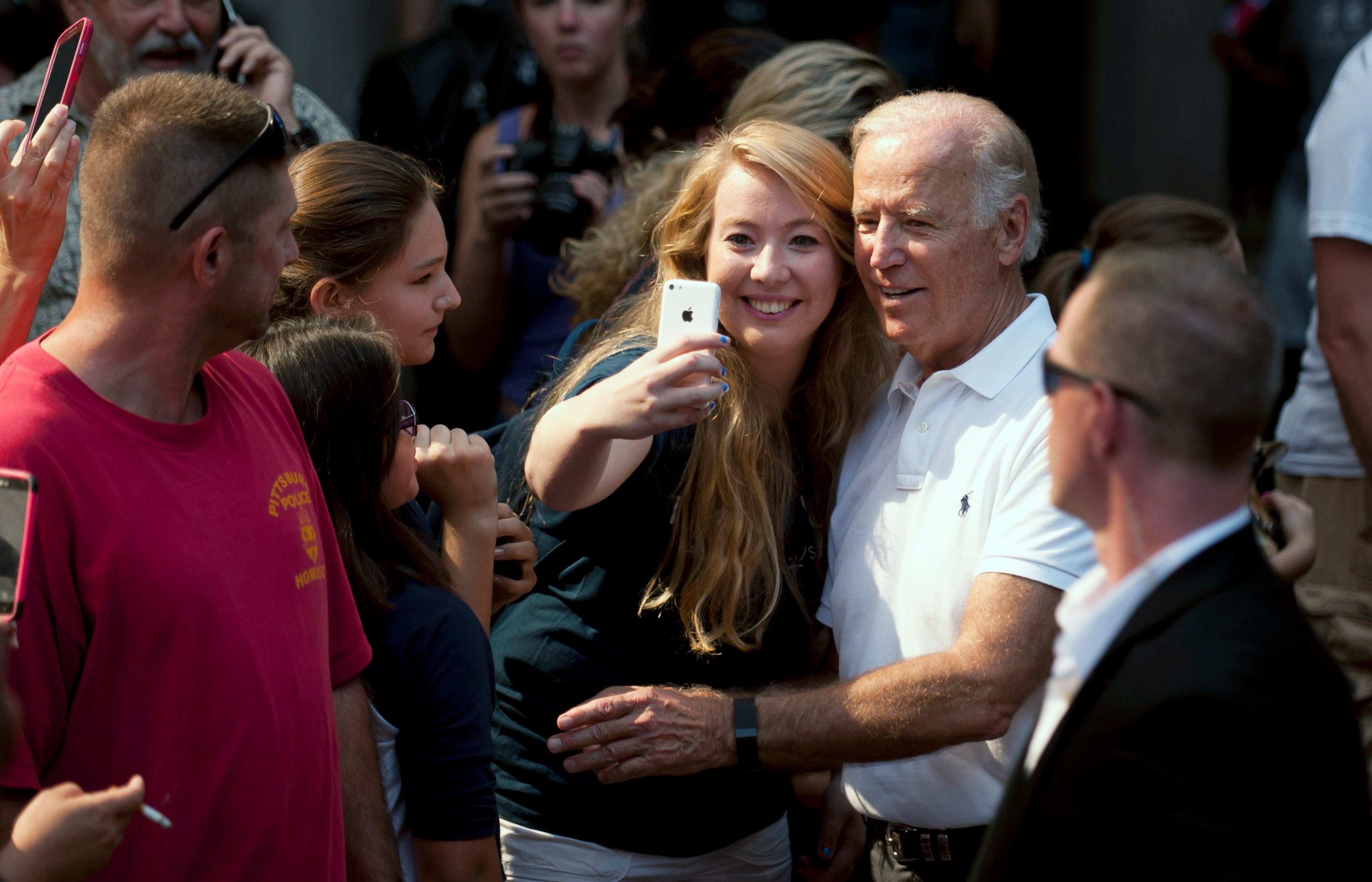 PITTSBURGH, PA - SEPTEMBER 7: U.S. Vice President Joe Biden takes a selfie with a supporter during the annual Allegheny County Labor Day Parade Monday September 7, 2015 in Pittsburgh, Pennsylvania. Biden has been subject of speculation about whether he will run for the U.S. presidency. (Photo by Jeff Swensen/Getty Images)