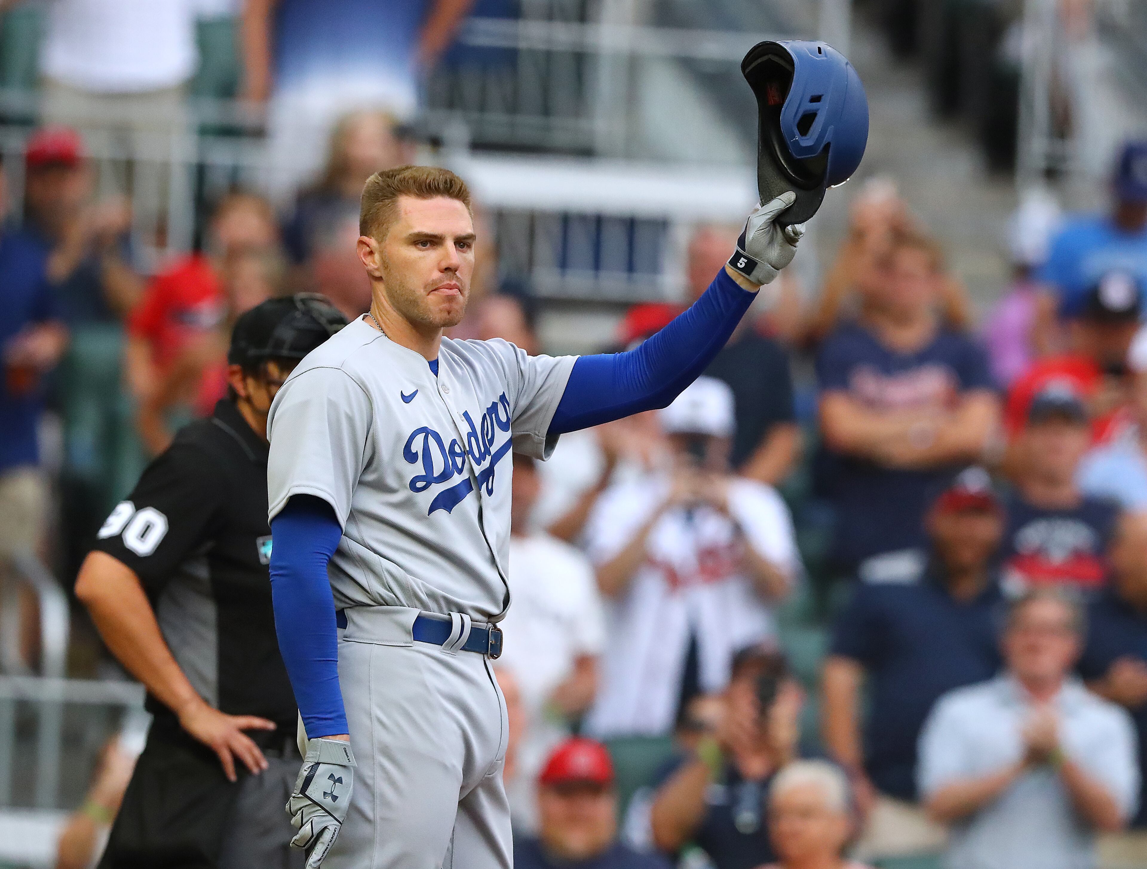 Former Atlanta Braves first baseman Freddie Freeman tips his helmet to fans as he bats in the first inning returning to Atlanta with the Los Angles Dodgers for a MLB baseball game on Friday, June 24, 2022, in Atlanta. The series marks Freeman’s first games in Atlanta since the longtime Braves star signed with the Dodgers as a free agent in March. “Curtis Compton / Curtis.Compton@ajc.com”