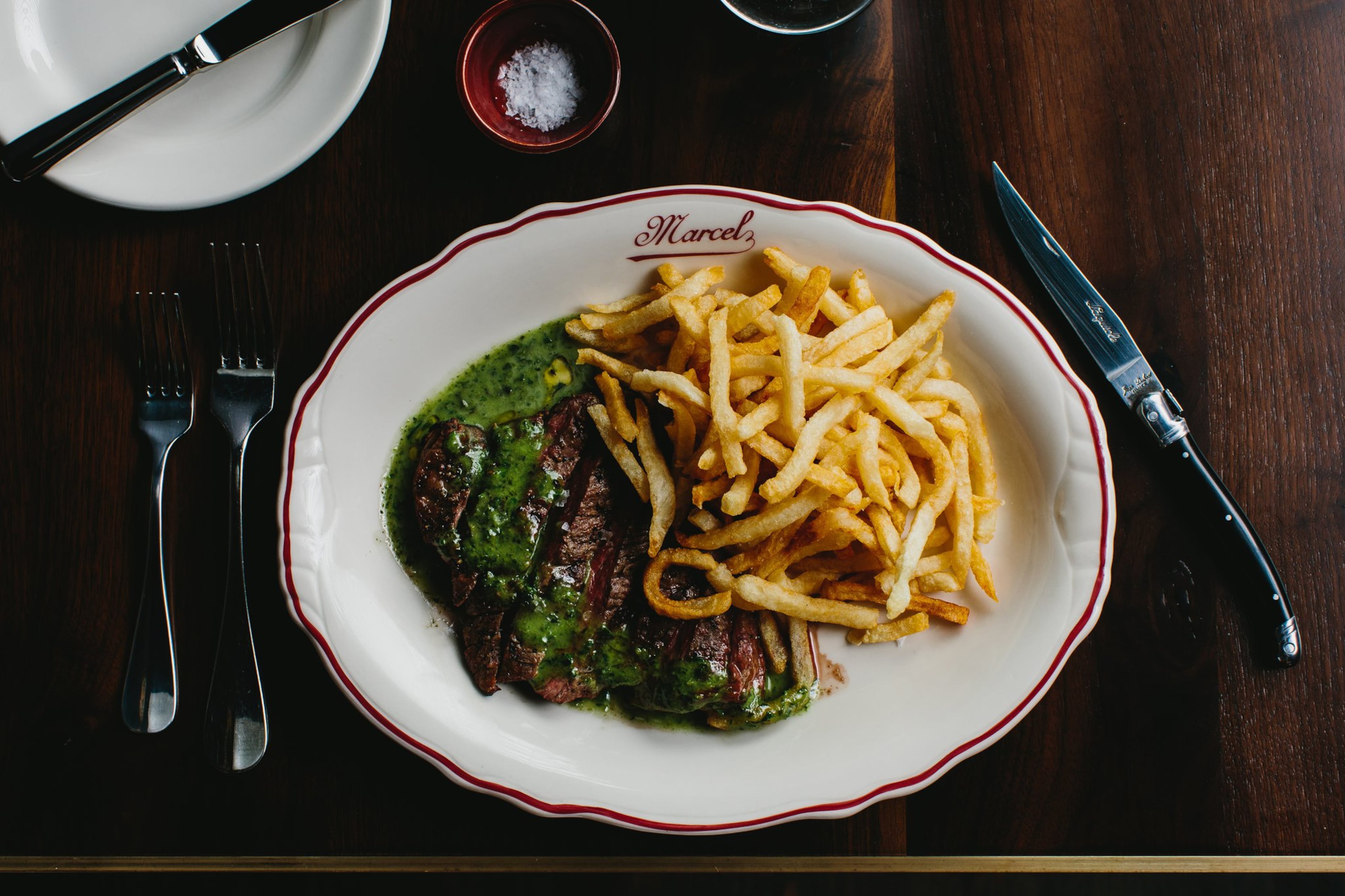L’Entrecote steak-frites with sauce verte at Marcel. (Courtesy of Marcel/Andrew Thomas Lee.)