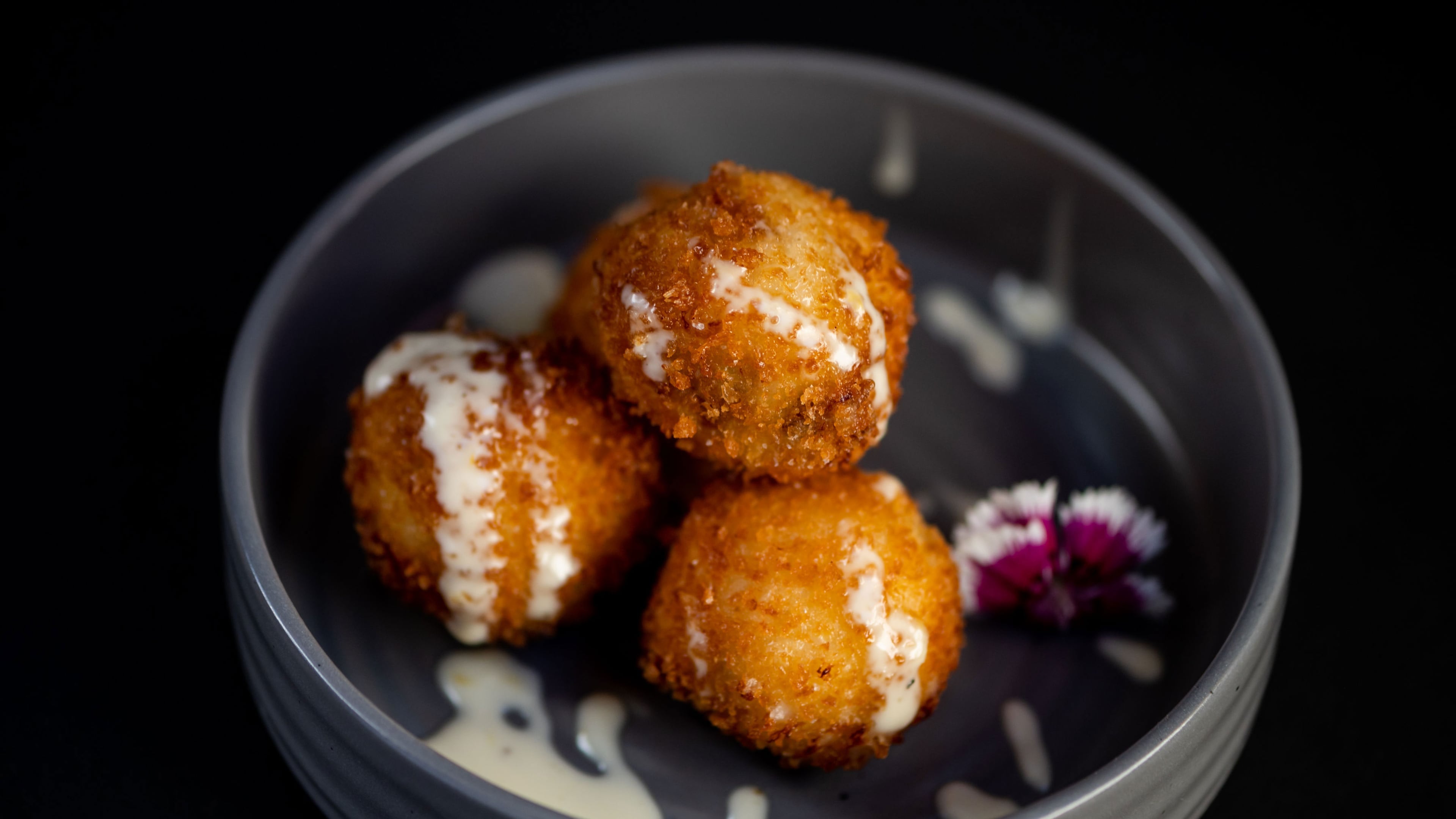 Croquetas at Casa Robles burst with the flavors of serrano ham and manchego cheese. Courtesy of Randi Curling