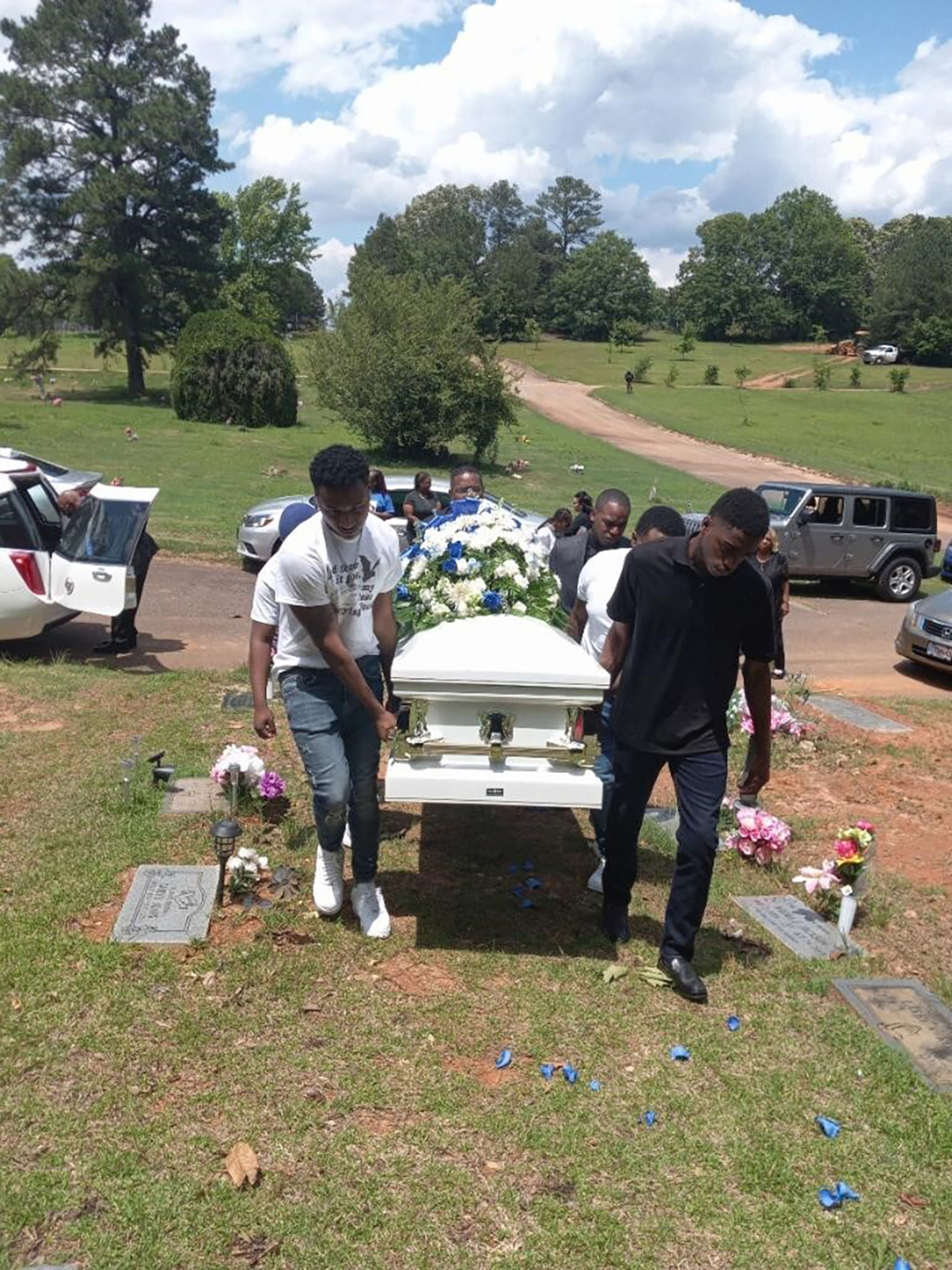 Pallbearers carry the casket of Marquis Jefferson. He was killed at Washington State Prison in May 2022 during a fight that involved multiple inmates. (Courtesy)