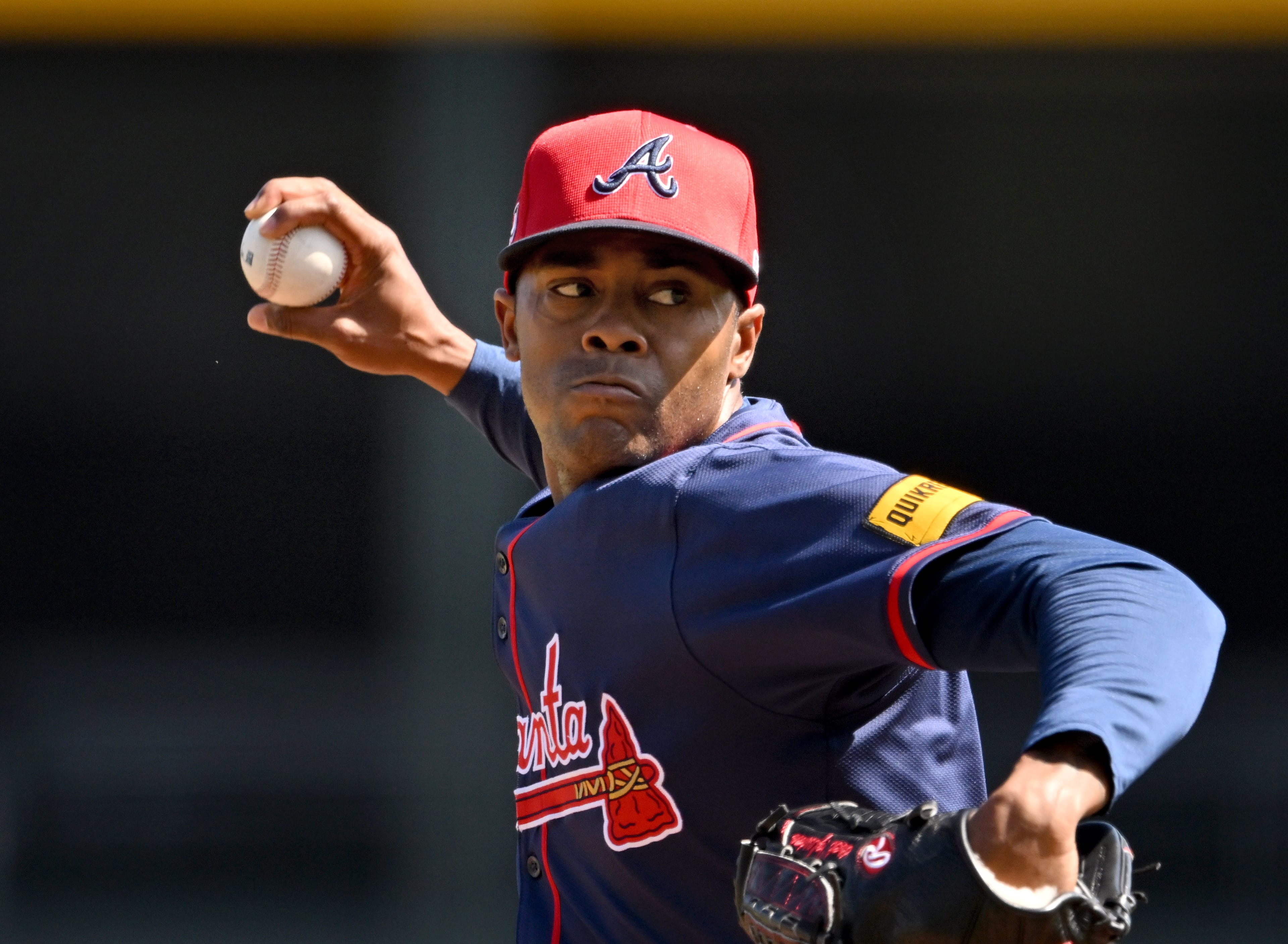 Atlanta Braves pitcher Raisel Iglesias throws a pitch during spring training workouts at CoolToday Park, Friday, Feb. 23, 2024, in North Port, Florida. (Hyosub Shin / Hyosub.Shin@ajc.com)