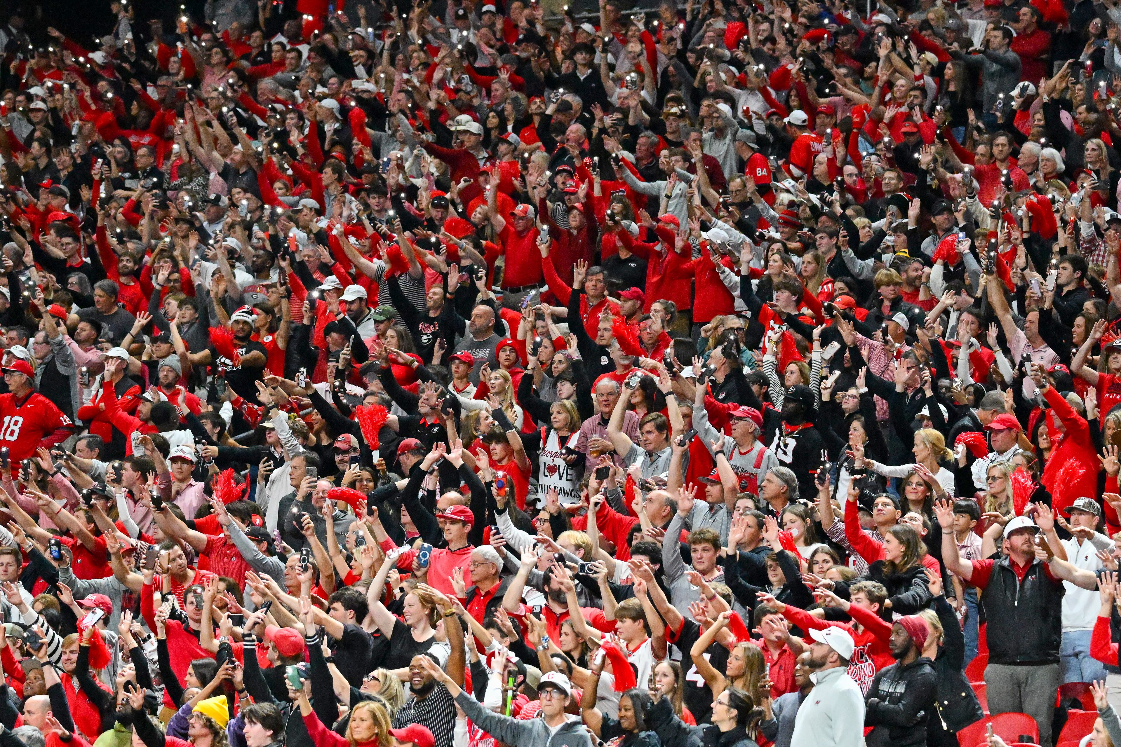 Georgia fans react against Alabama during the fourth quarter of the SEC Championship game at Mercedes-Benz Stadium, Saturday, Dec. 6, 2025, in Atlanta. (Hyosub Shin / AJC)