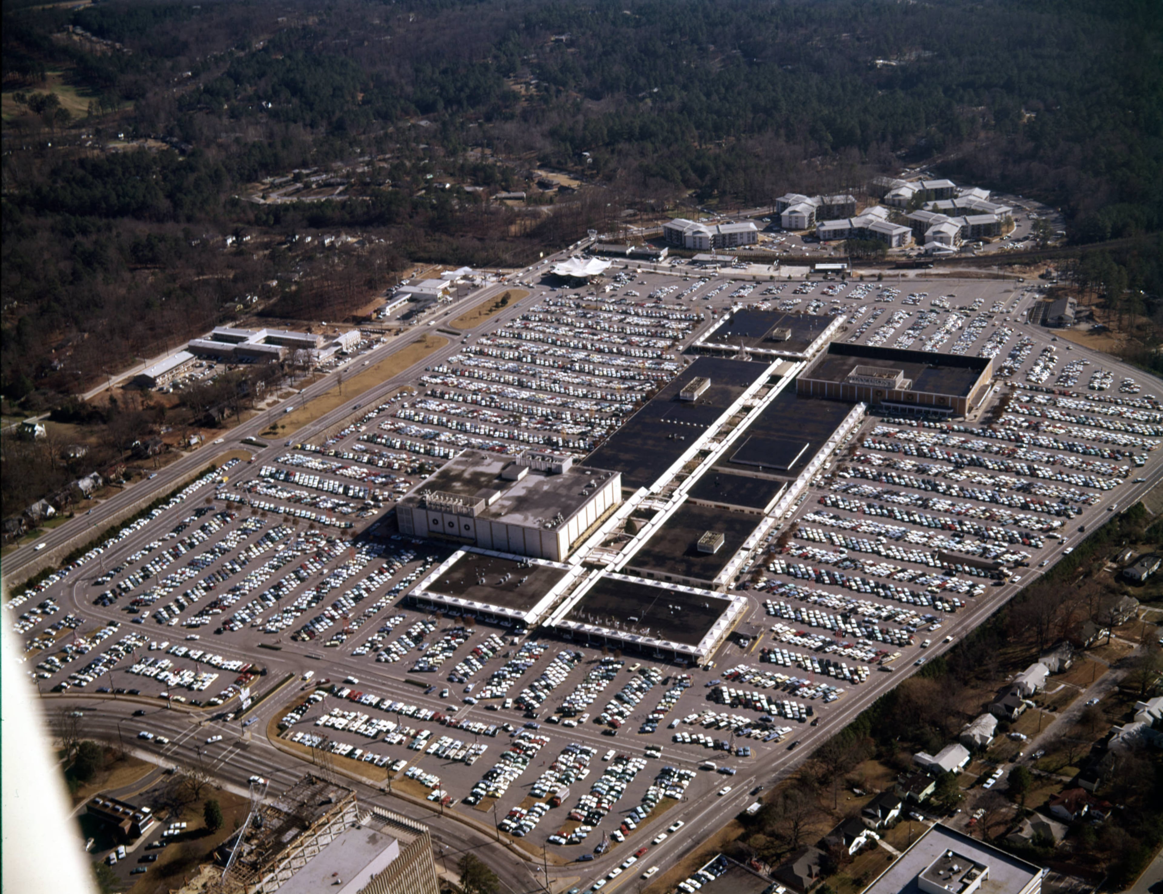 Aerial view of Lenox Square and its surrounding parking lot, looking southeast, Buckhead, Atlanta, Georgia, December 21, 1965.