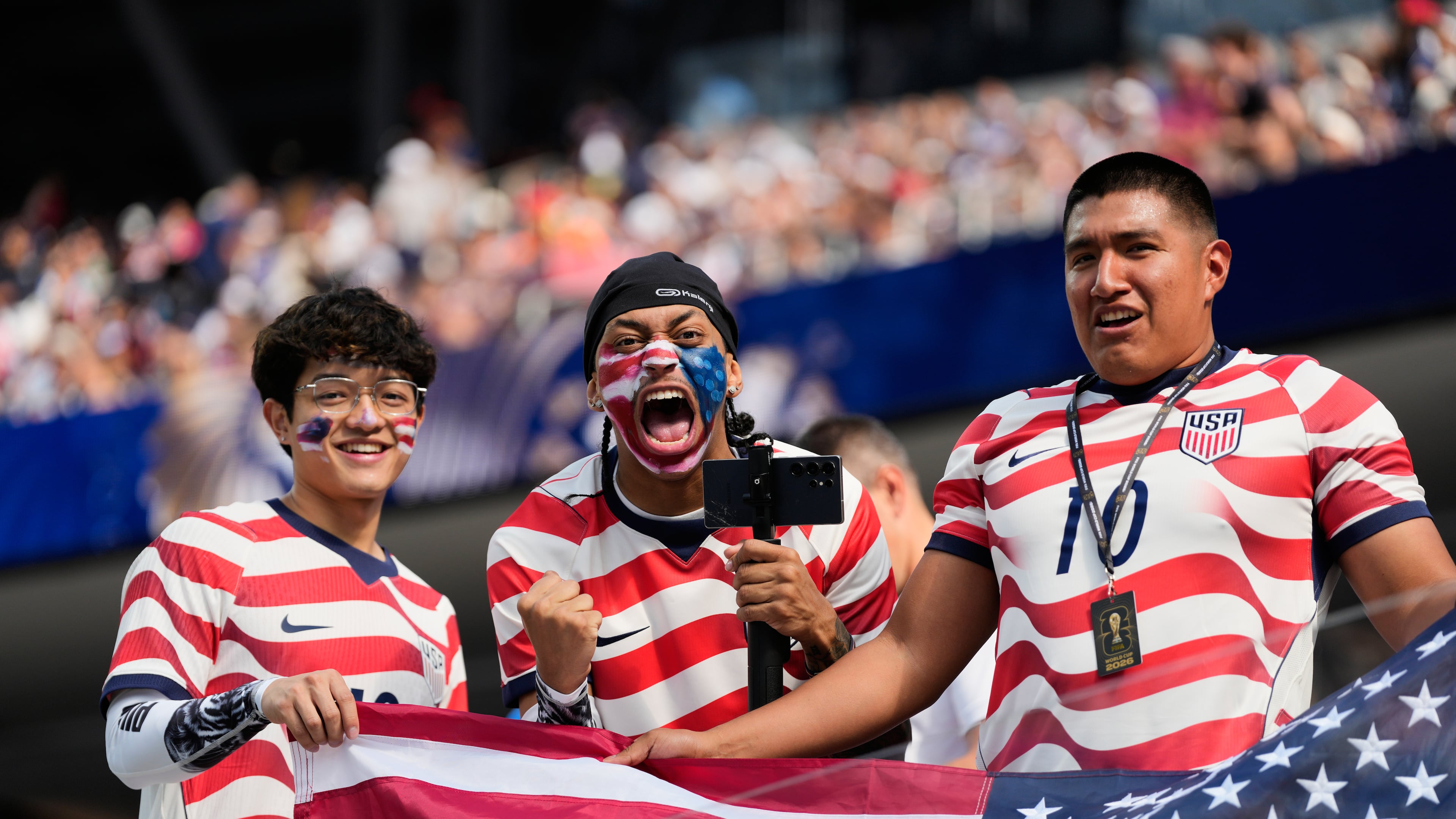 United States fans cheer prior to the World Cup Group D soccer match between the United States and Paraguay in Inglewood, Calif., near Los Angeles, Friday, June 12, 2026. (AP Photo/Andre Penner)