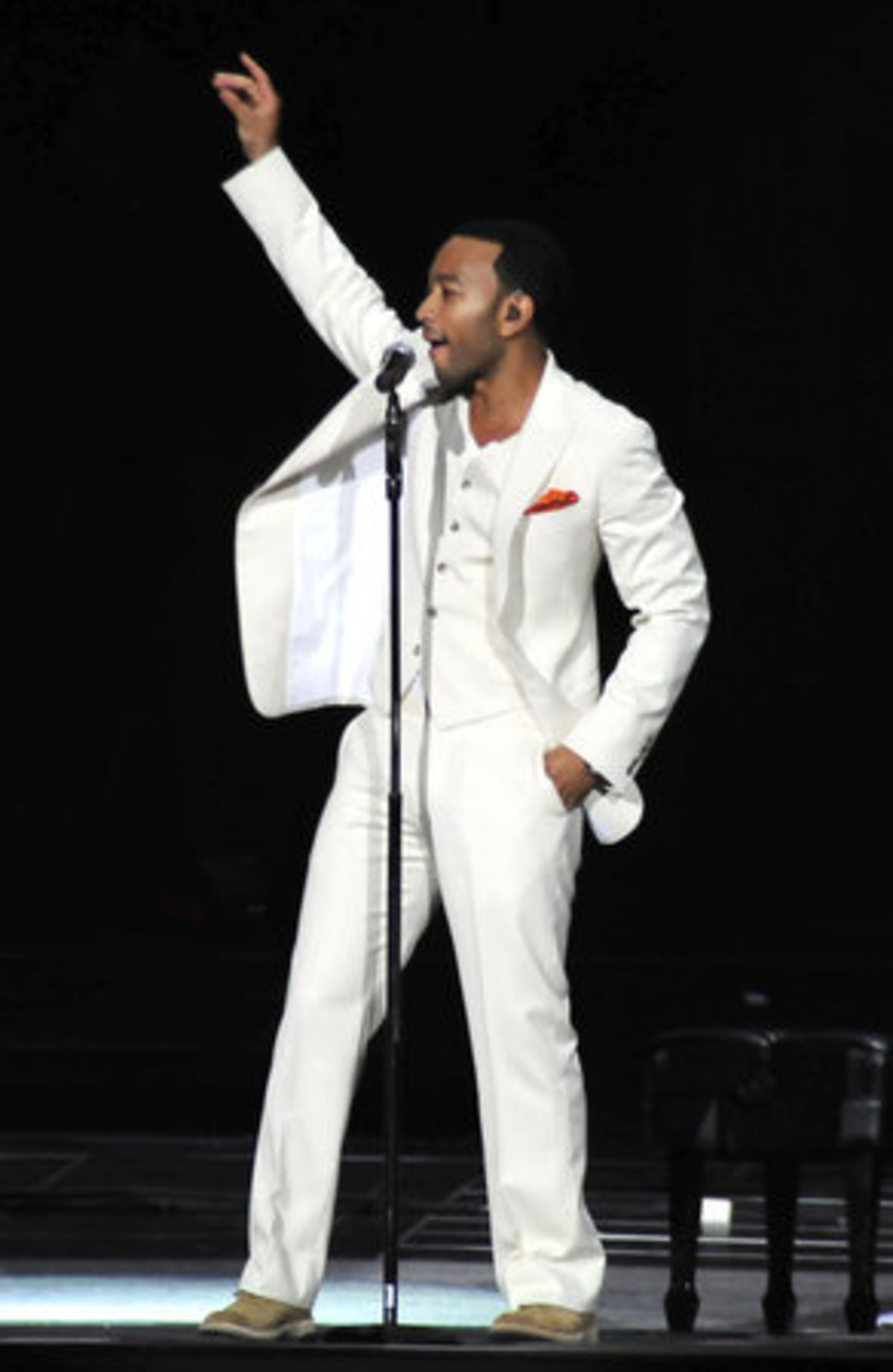 John Legend strikes a disco pose.