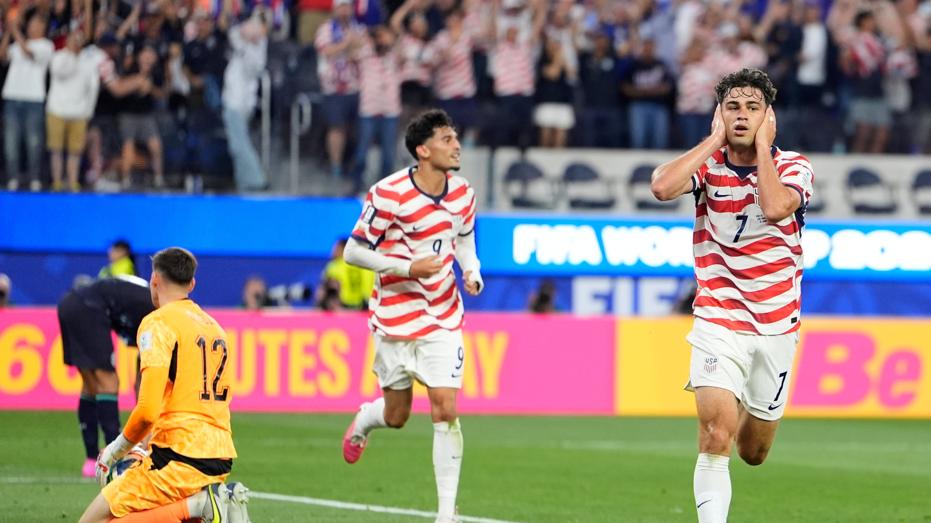 United States' Giovanni Reyna, right, reacts after scoring his team's fourth goal during the World Cup Group D soccer match between the United States and Paraguay in Inglewood, Calif., near Los Angeles, Friday, June 12, 2026. (AP Photo/Mark J. Terrill)