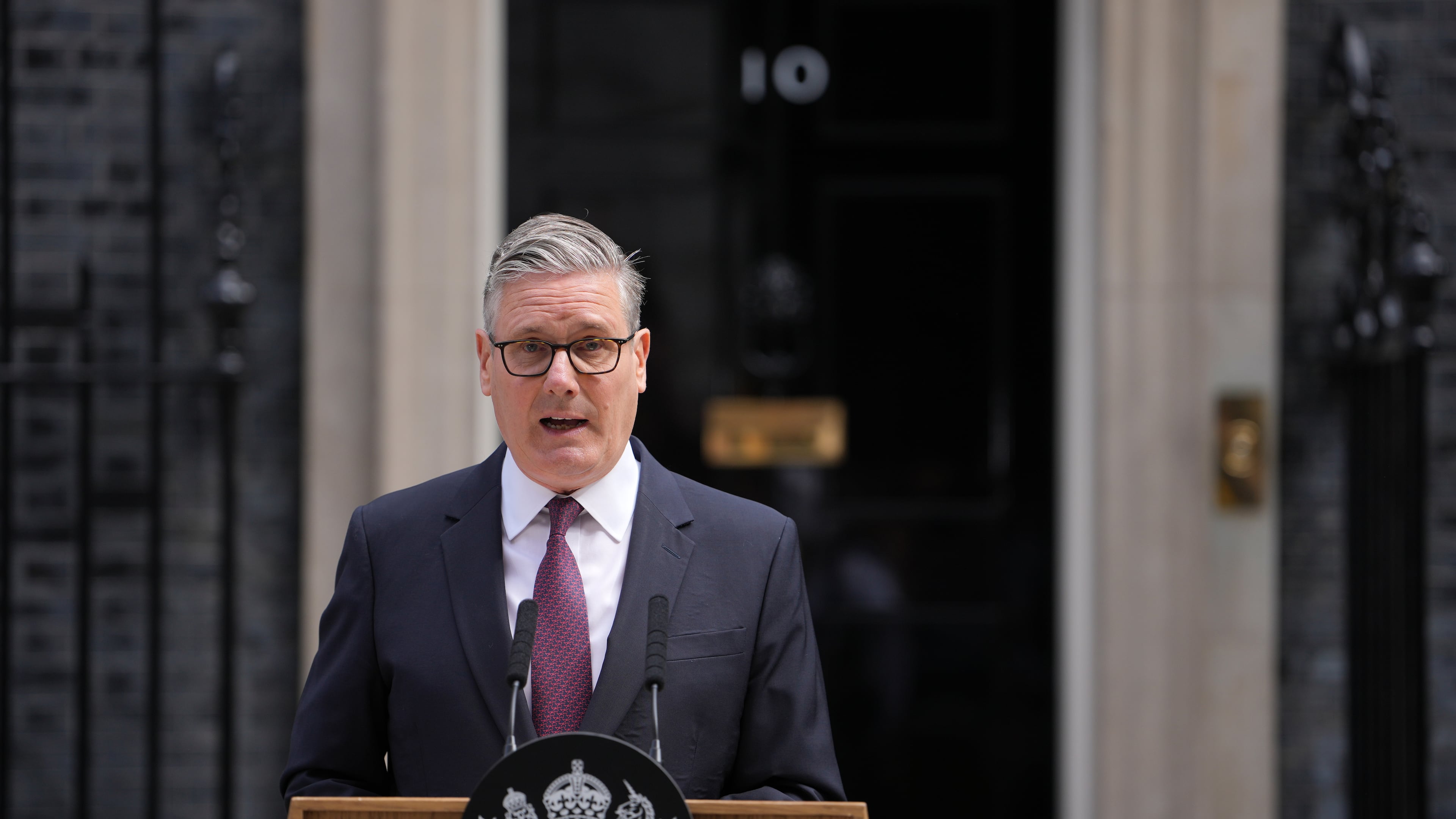 Britain's Prime Minister Keir Starmer announces his resignation to the media outside 10 Downing Street in London, Monday, June 22, 2026. (AP Photo/Kin Cheung)
