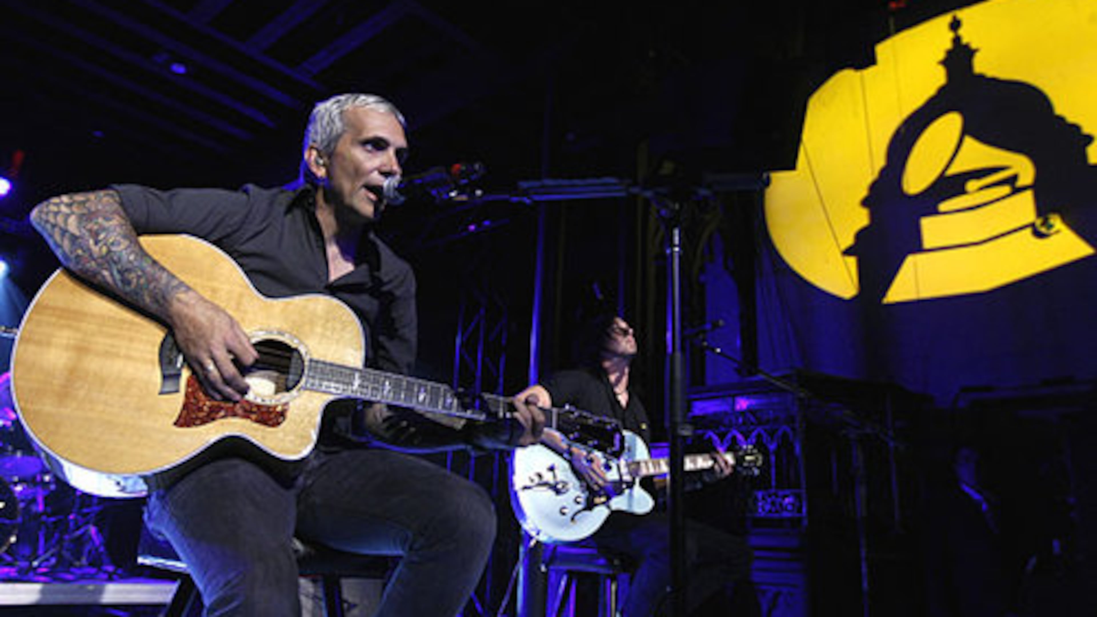 Musician Art Alexakis, of Everclear, performs with the band at the Grammy's Rock The Conventions concert in Denver.