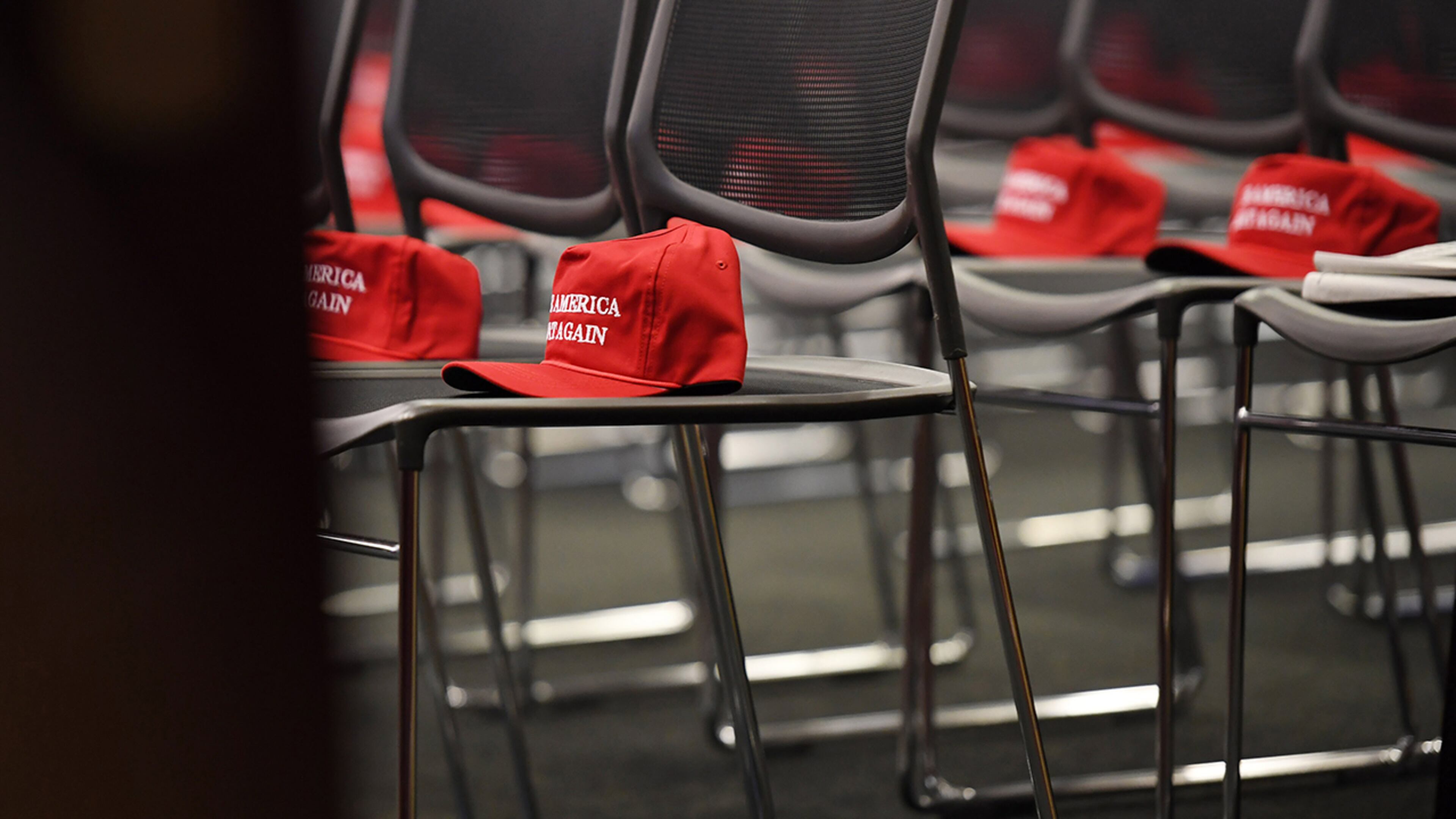 "Make America great again" hats await attendees at a Republican event at the Capitol. As President-elect Donald Trump plans his transition to power, he appears to be increasingly uncomfortable with outsiders and suspicious of the "bicoastal elite," in the words of an insider.