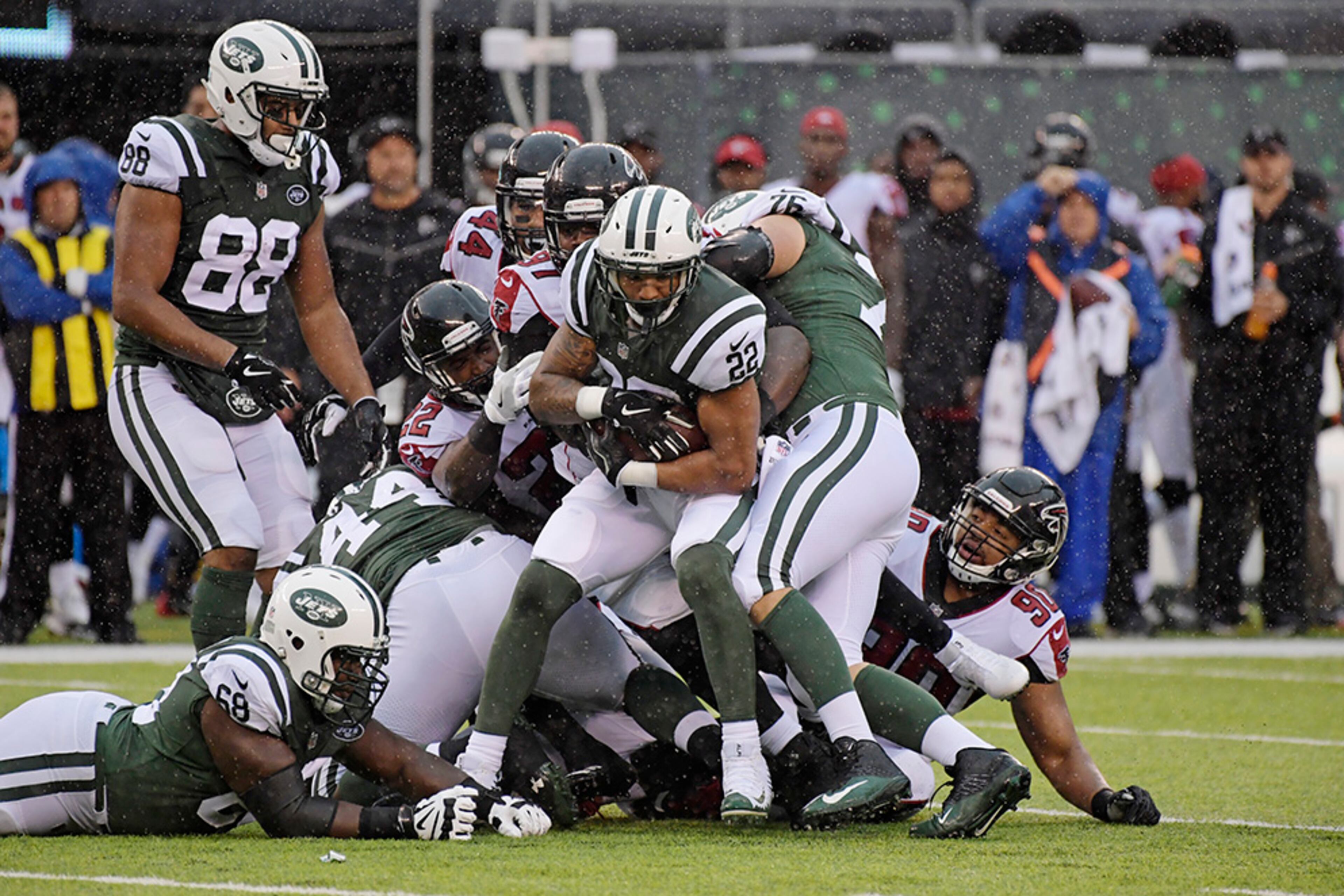 New York Jets' Matt Forte (22) is tackled during the first half of an NFL football game against the Atlanta Falcons Sunday, Oct. 29, 2017, in East Rutherford, N.J. (AP Photo/Bill Kostroun)