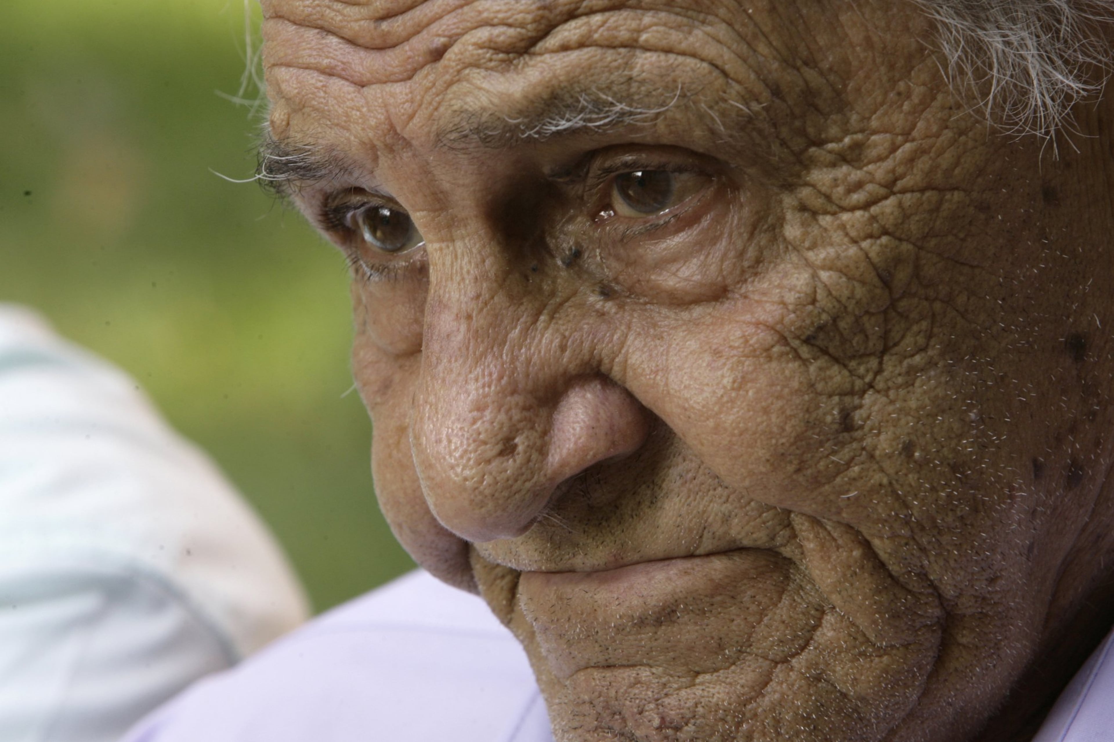 William "Wild Bill" Guarnere, shown here in 2002, never got to meet Dewitt Lowrey again after the war. Lowrey preferred to put the memories of the war behind him. (AP Photo/Matt Rourke)