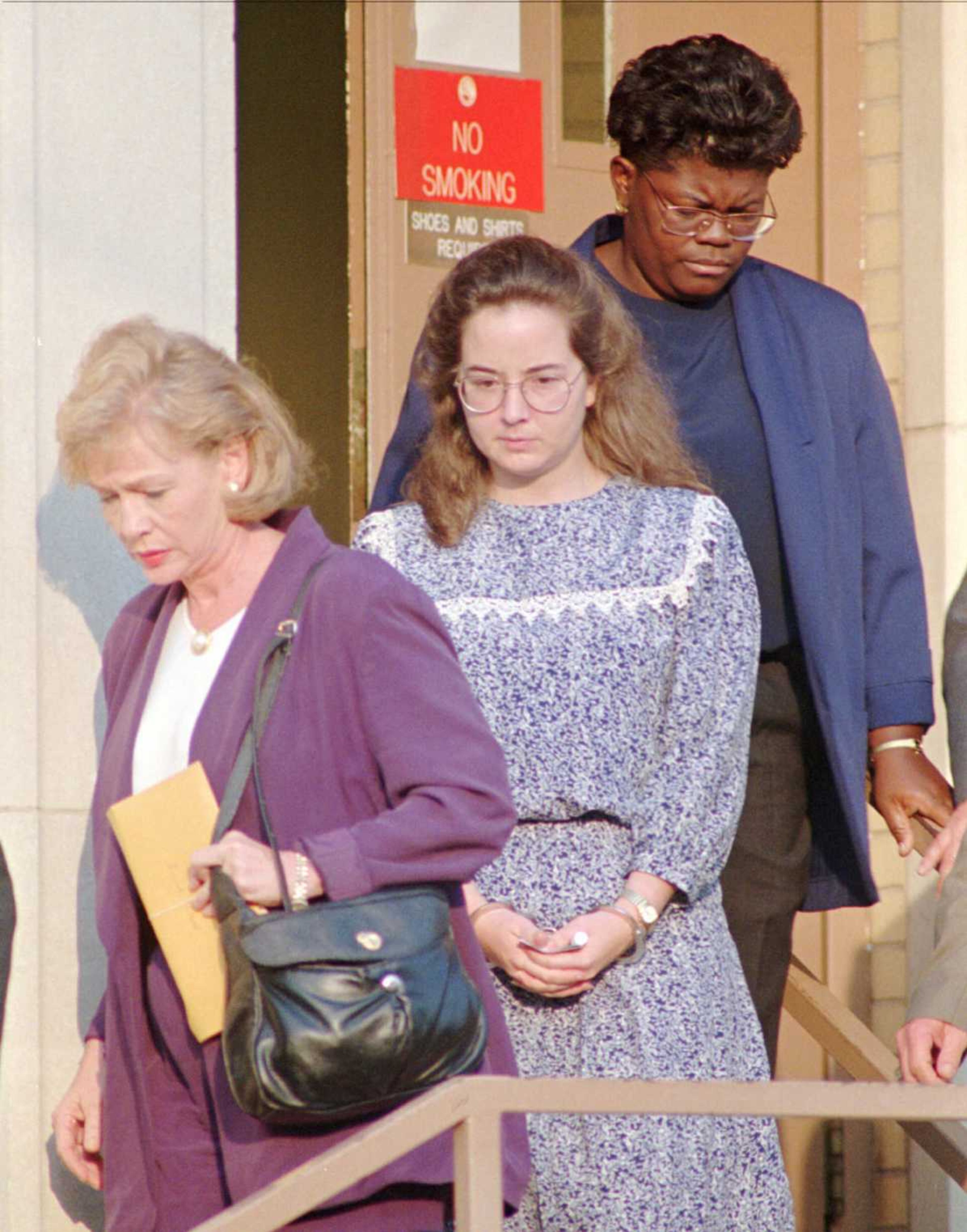 Susan Smith center is escorted from the Union County Courthouse in Union S C on Tuesday July 11 1995 A judge ruled Tuesday that she was competent to stand trial for the murder of her two sons Alex and Micahel Jury selection also began for the trial which is expected to run up to six weeks in length (AP Photo Dave Martin)