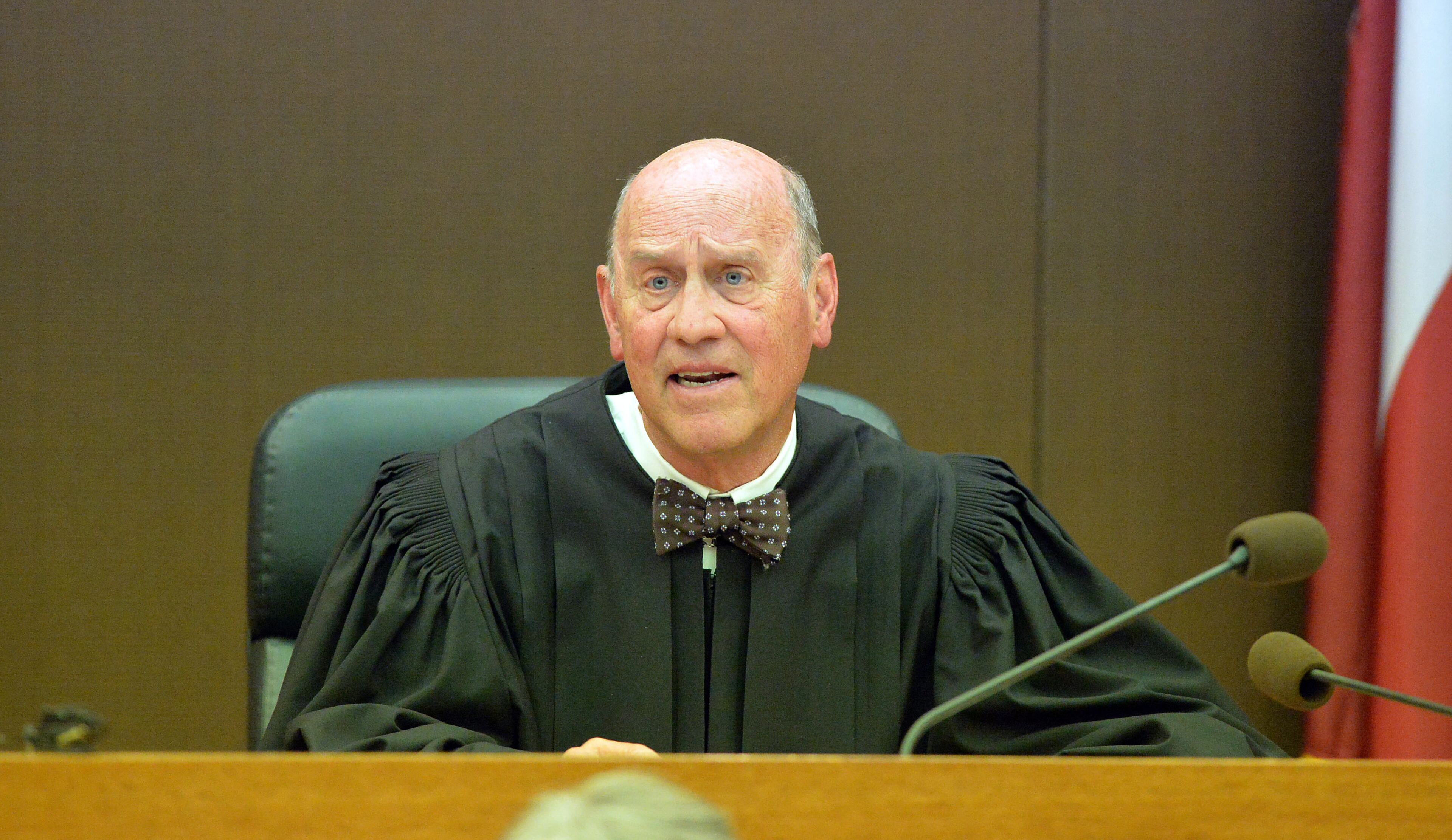 Fulton County Superior Court Judge Jerry Baxter talks to the jury as he releases them from service. A jury of six men and six women rendered their verdicts on the eighth day of deliberations in the Atlanta Public Schools test-cheating trial on Wednesday, April 1, 2015. Jurors sorted through roughly five months of testimony against 12 former educators accused of engaging in a racketeering conspiracy to inflate test scores. (Atlanta Journal-Constitution, Kent D. Johnson, Pool)