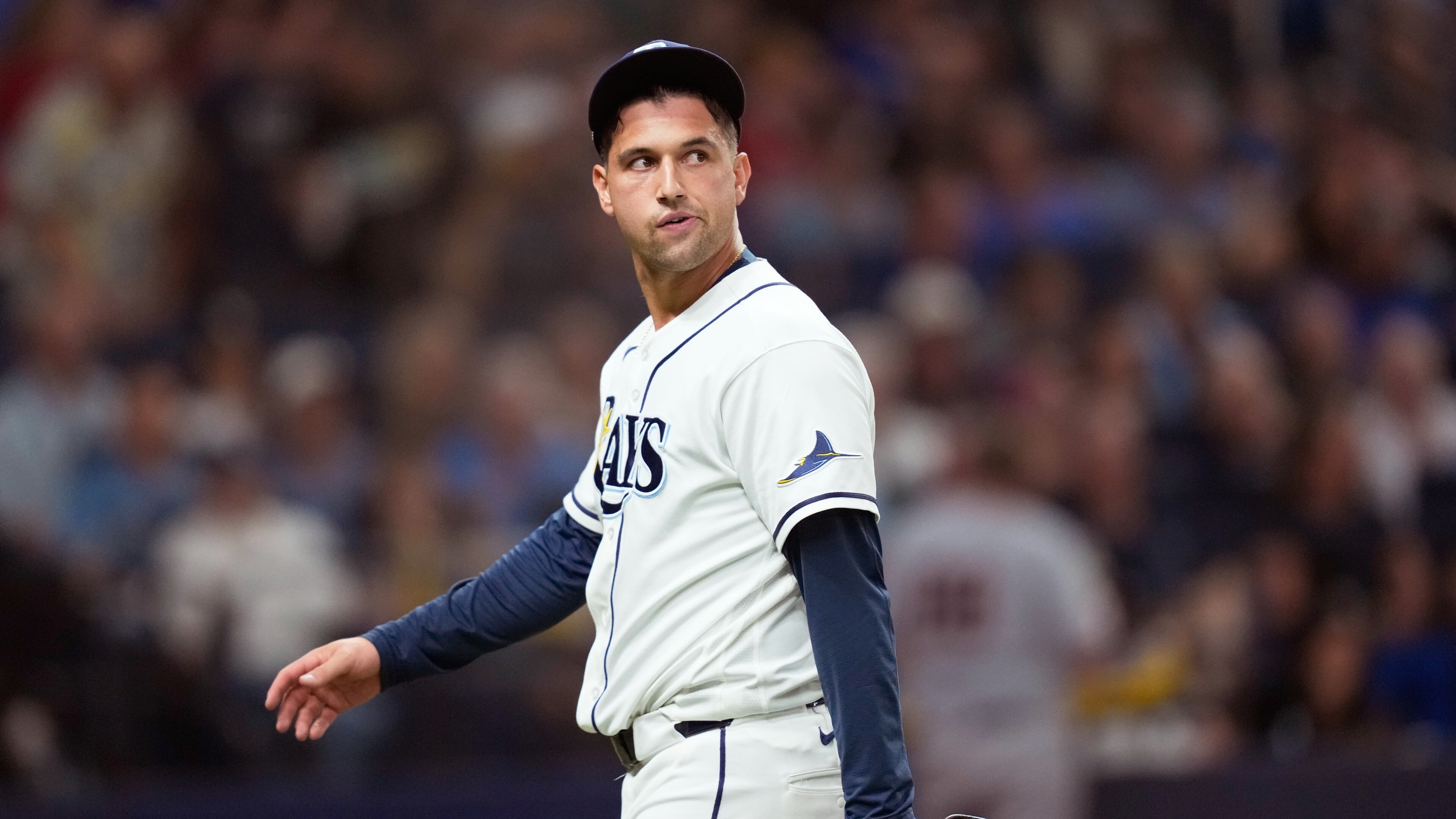 Tampa Bay Rays pitcher Ian Seymour reacts after giving up two runs against the Cleveland Guardians during the eighth inning in Game 1 of an American League Championship Series baseball game in St. Petersburg, Fla. Monday, Oct. 12, 2026. (AP Photo/David J. Phillip)