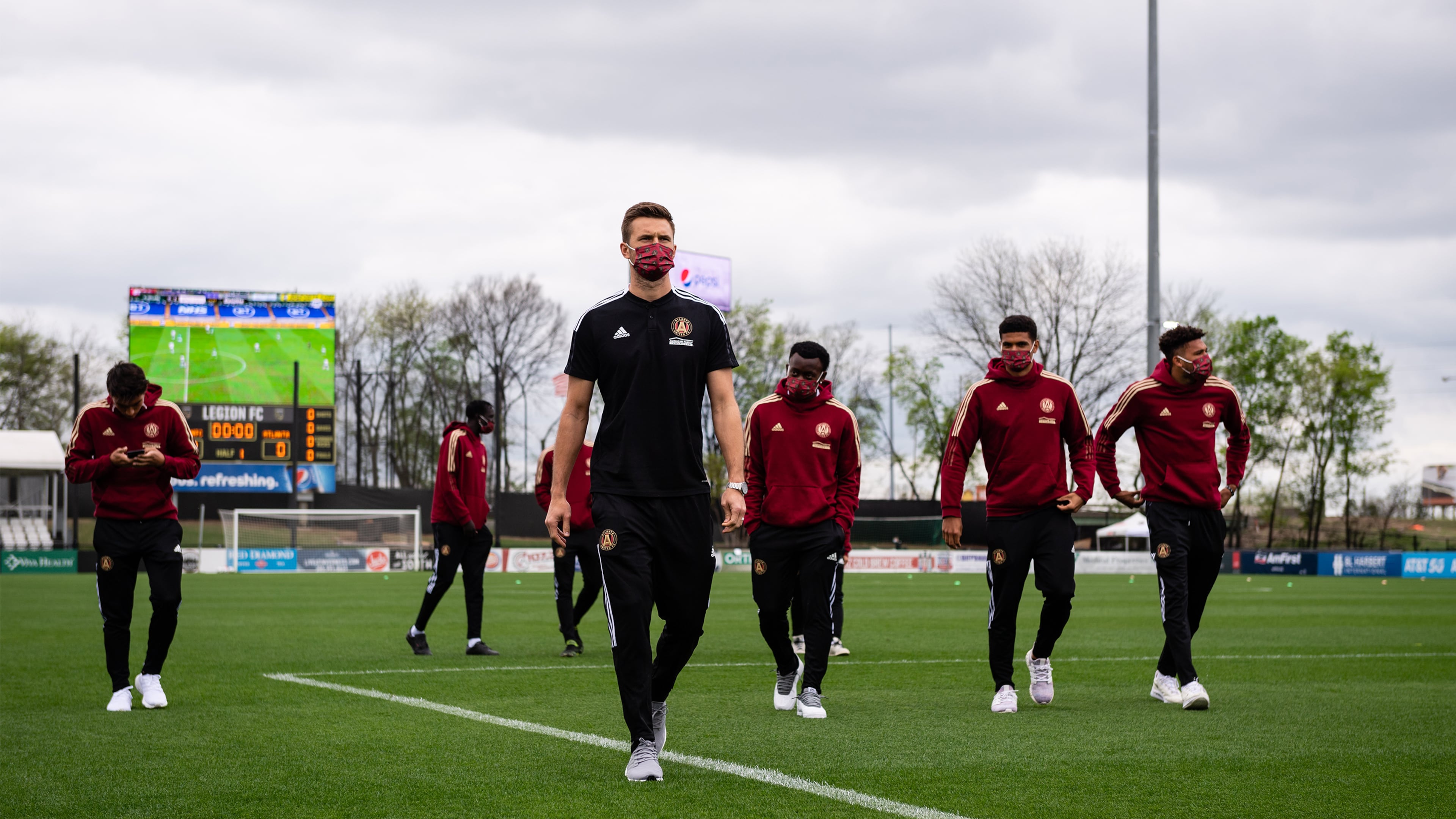Atlanta United goalkeeper Ben Lundaard (18) and his teammates arrive before a friendly match against Birmingham Legion FC Sunday, March 28, 2021, at BBVA Field in Birmingham, Ala. (Jacob Gonzalez/Atlanta United)
