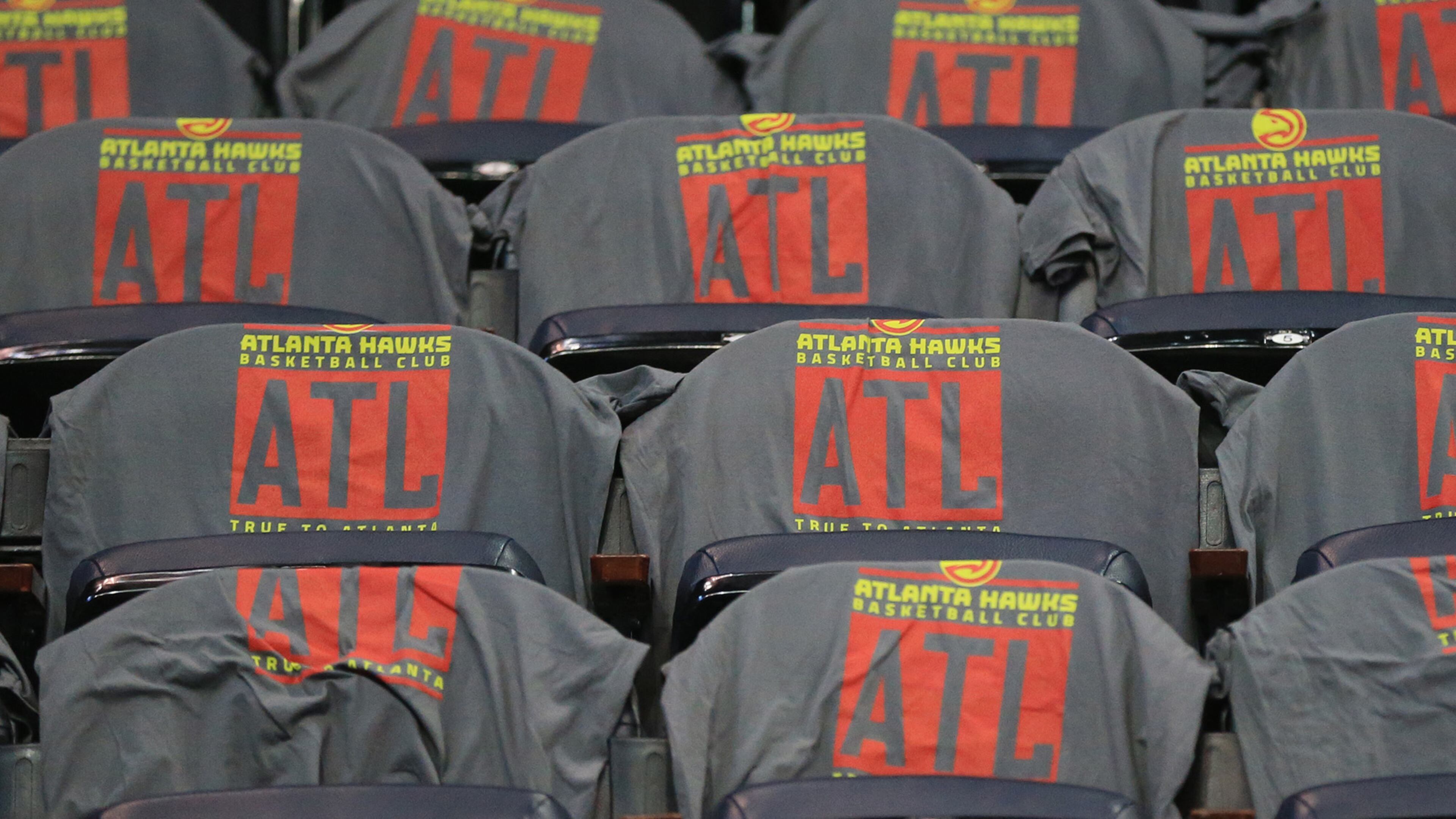 102715 ATLANTA: -- Hawks shirts bearing the new logo cover the seats for fans for the first regular season basketball game "home opener" against the Pistons on Tuesday, Oct. 27, 2015, in Atlanta. Curtis Compton / ccompton@ajc.com