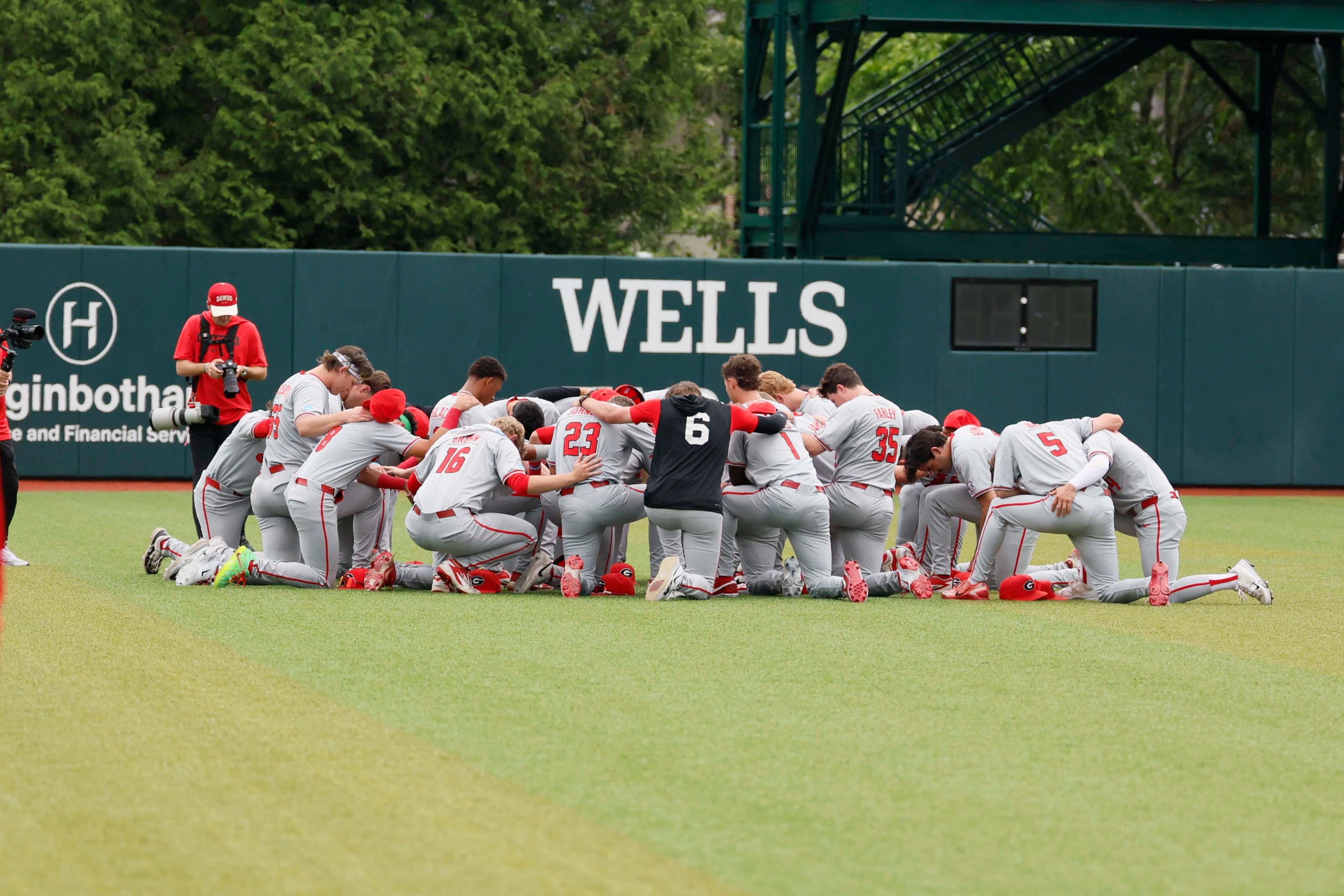 Georgia Bulldog players gather moments before they face the Mississippi State Bulldogs for Game 2 of the NCAA Super Regional at Foley Field on Sunday, June 7, 2026, in Athens. Miguel Martinez/AJC)