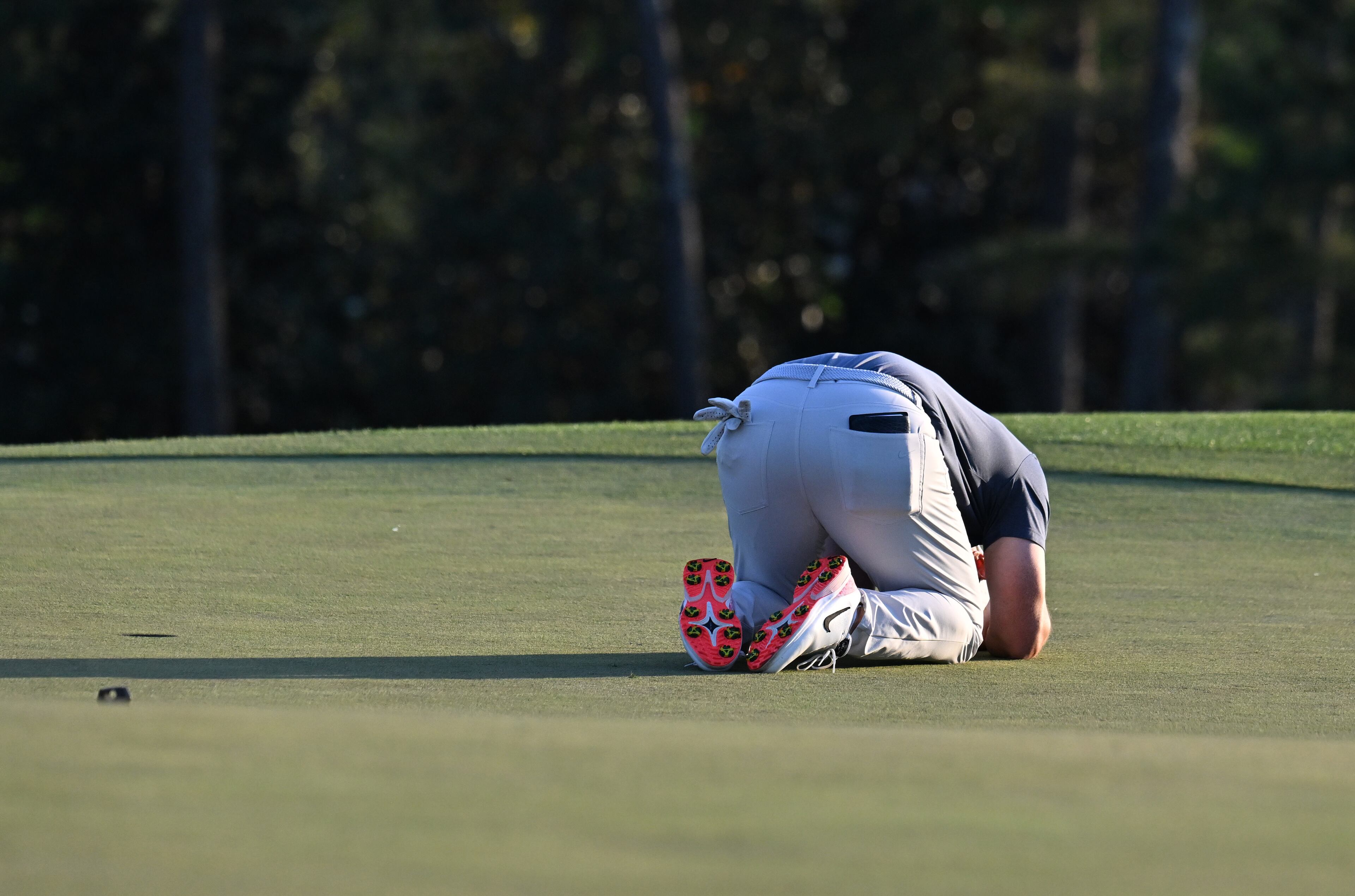 Rory McIlroy celebrates winning the Masters golf tournament with a birdie in the first playoff hole during final round of the Masters golf tournament, at Augusta National Golf Club, Sunday, April 13, 2025, in Augusta, Ga. (Hyosub Shin / AJC)