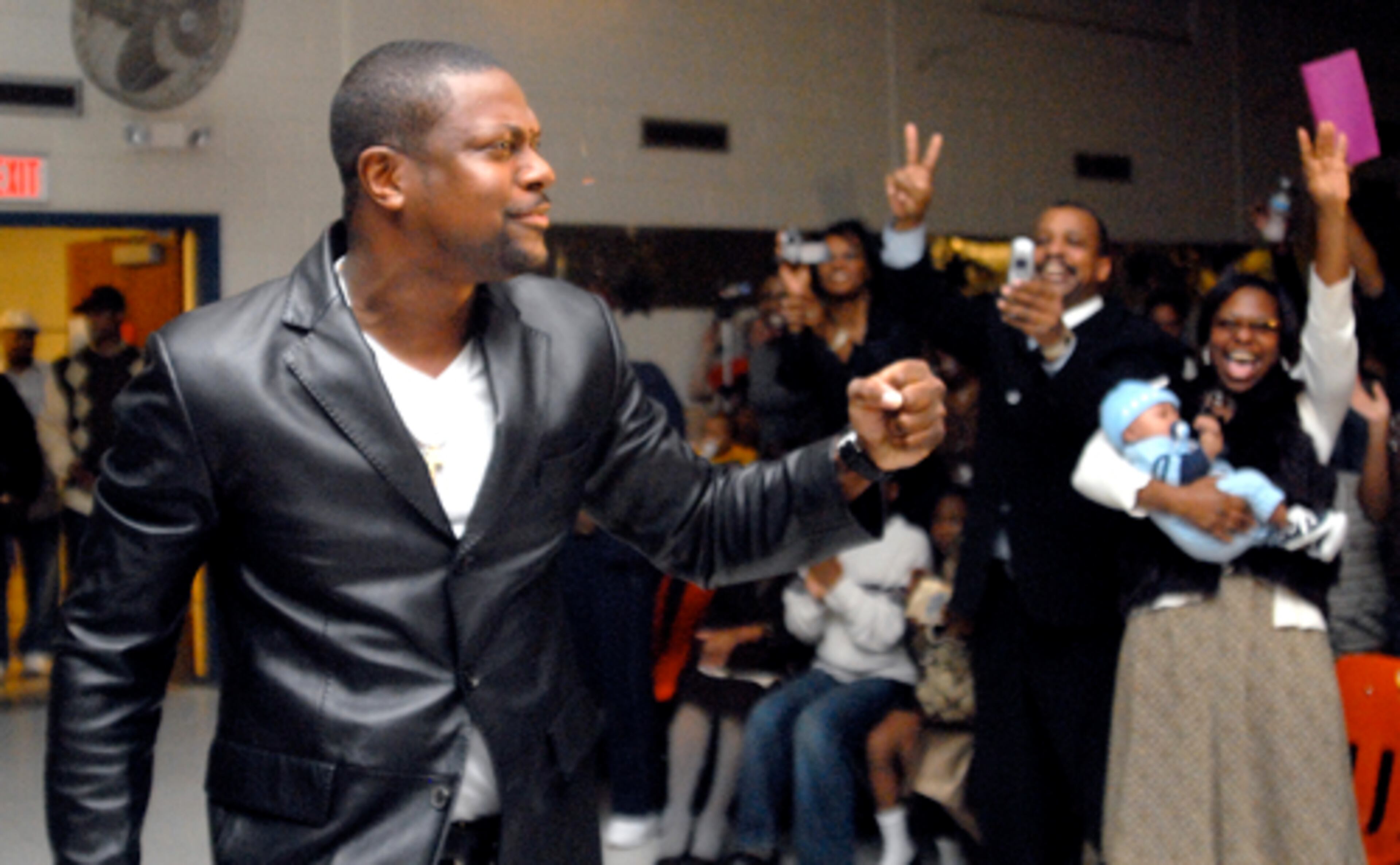 Celebrity judge and Snapfinger alumnus Chris Tucker receives an ovation as he is announced as a celebrity judge at Snapfinger Elementary's annual talent show. Other celebrity judges included TLC's T-Boz, Blaque and Eighty-Eight Fingers.