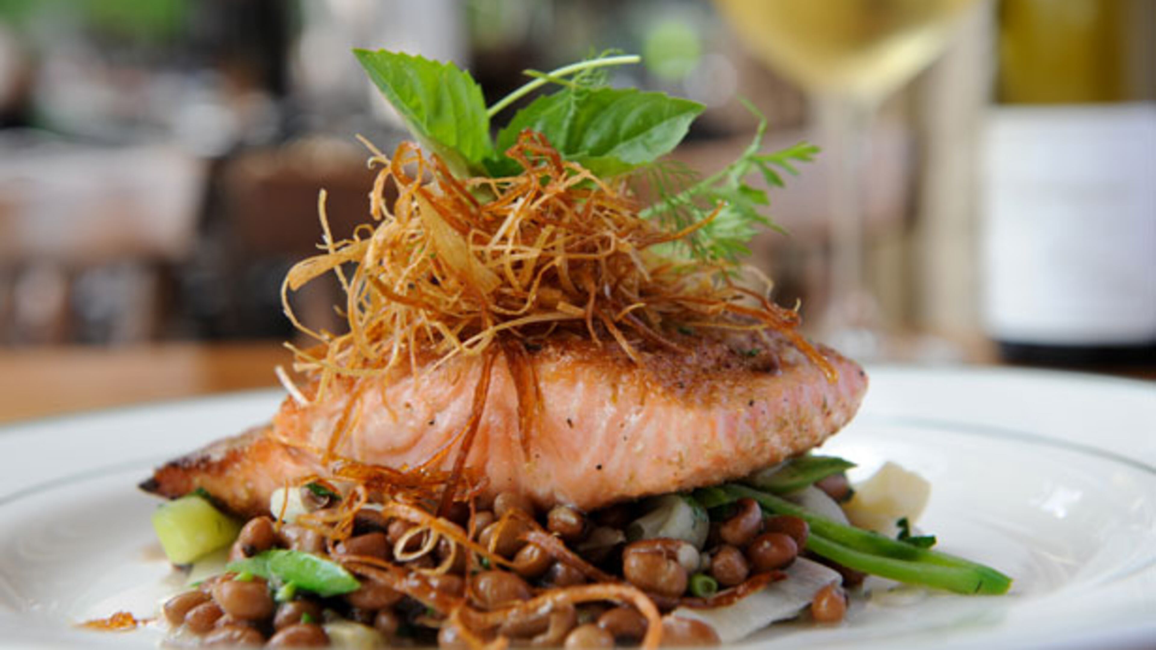 Verlasso salmon, Sea Island red peas and sugar snaps at Opulent in Roswell.