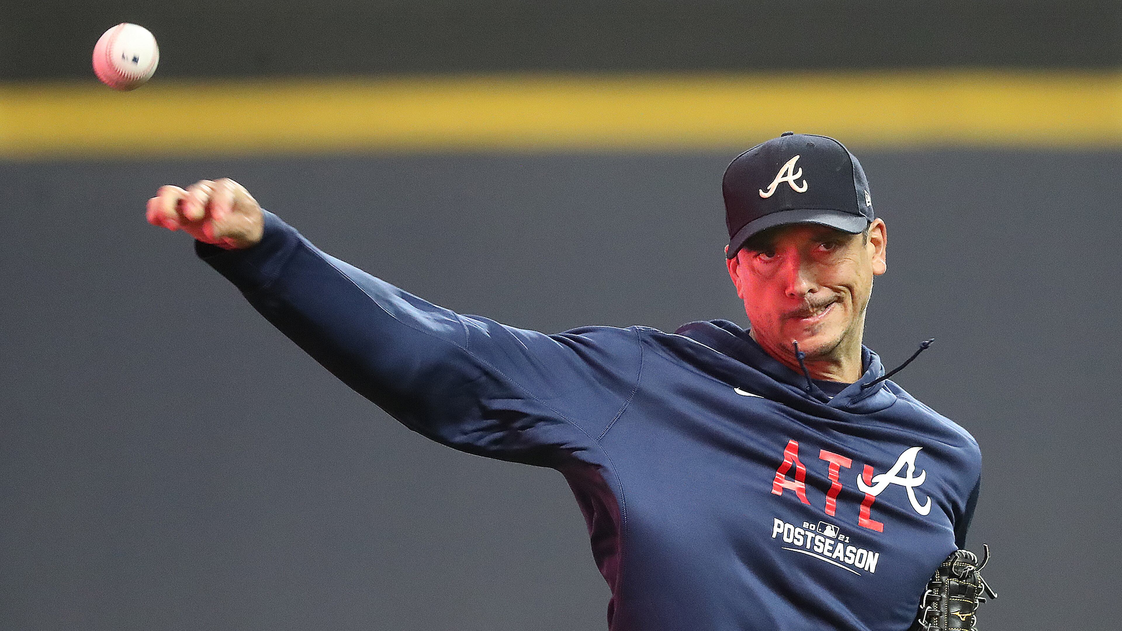 Braves veteran right-hander Charlie Morton, who will start Game 1 of the National League Division Series against the Brewers, keeps his arm loose during team practice at American Family Field on Thursday, Oct. 7, 2021, in Milwaukee. “Curtis Compton / Curtis.Compton@ajc.com”