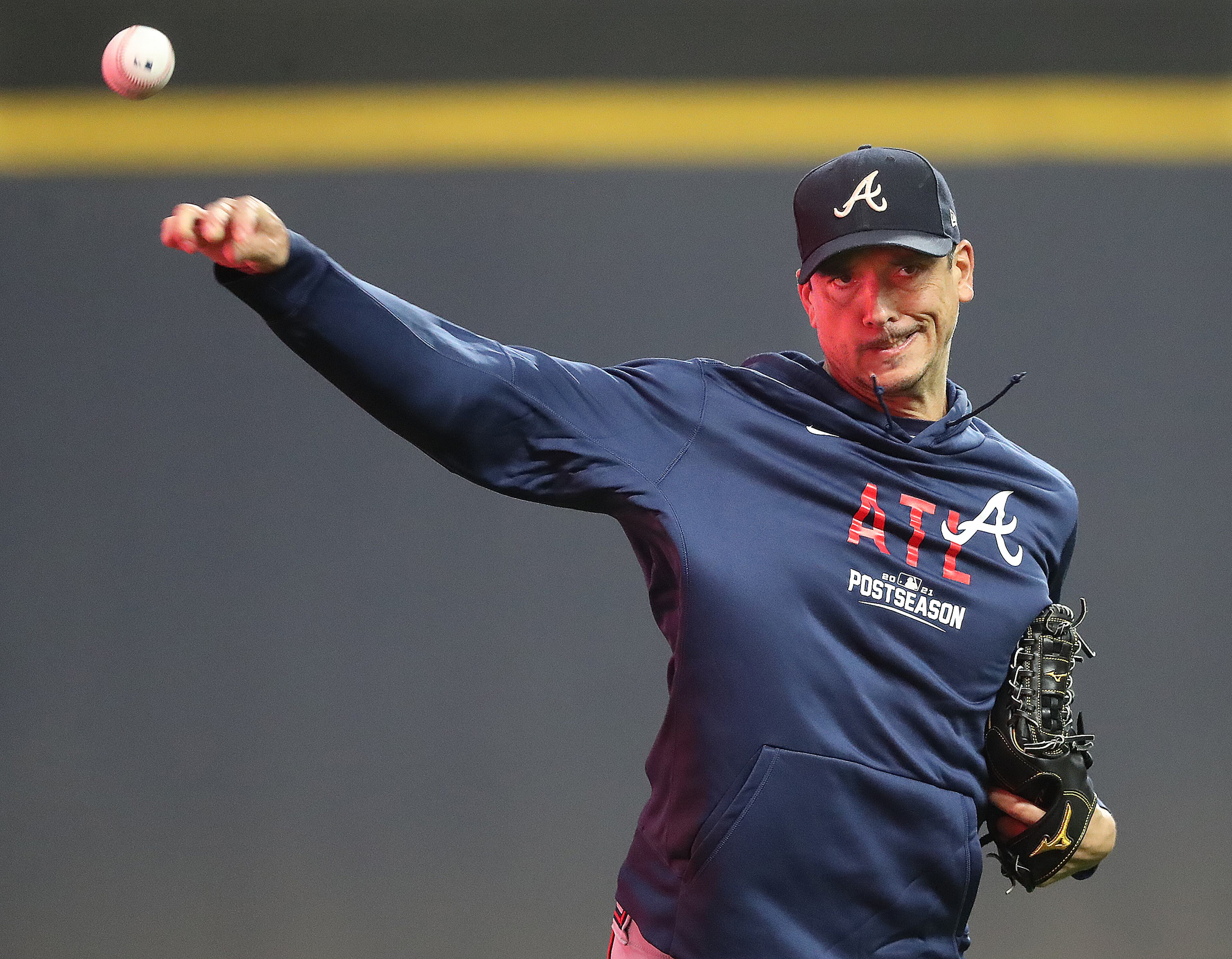 Braves veteran right-hander Charlie Morton, who will start Game 1 of the National League Division Series against the Brewers, keeps his arm loose during team practice at American Family Field on Thursday, Oct. 7, 2021, in Milwaukee. “Curtis Compton / Curtis.Compton@ajc.com”