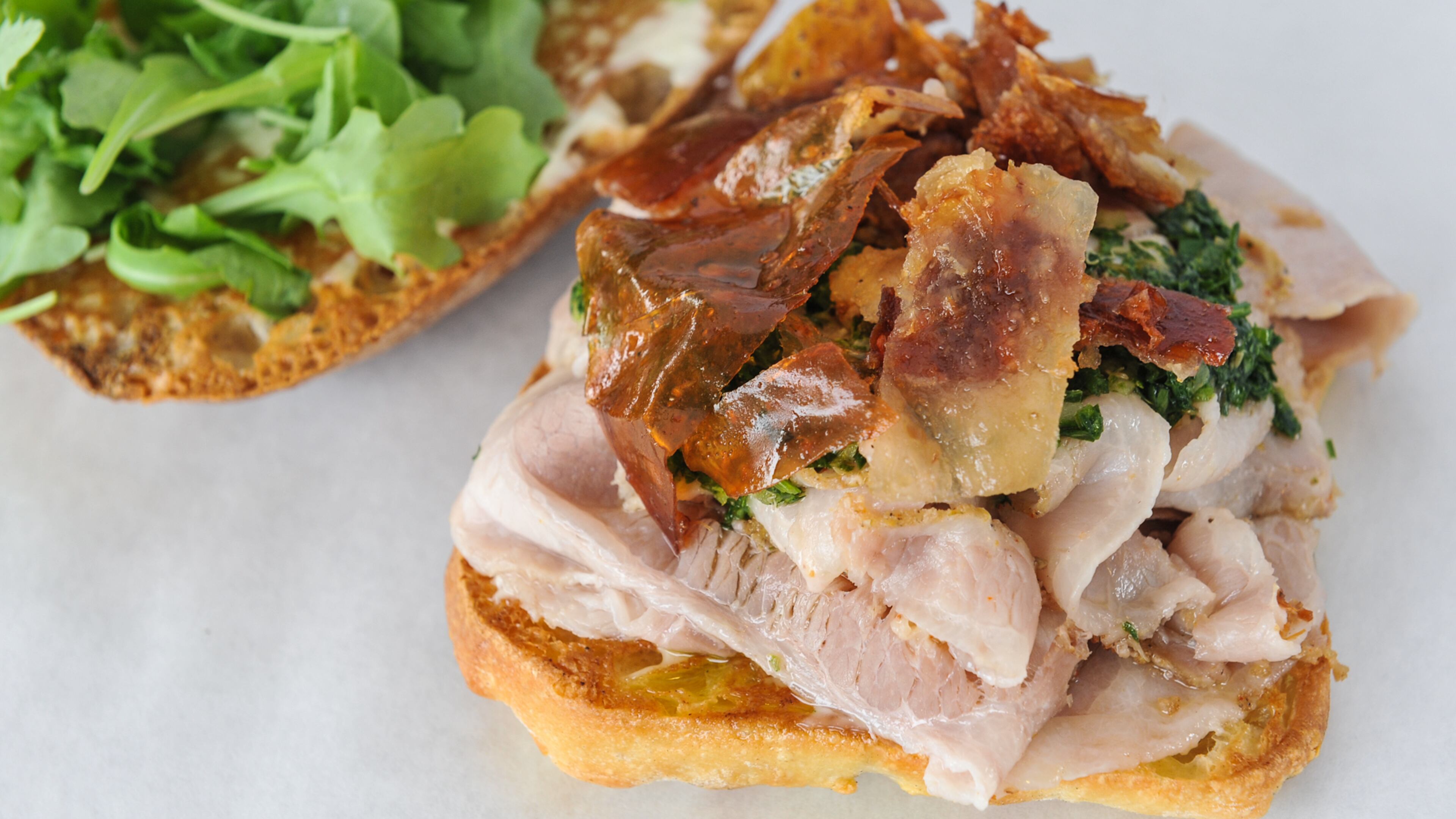 The porchetta - salsa verde, arugula, aioli - at Fred's Meat & Bread. Read reviews of Fred's and Yalla here.(Beckysteinphotography.com)