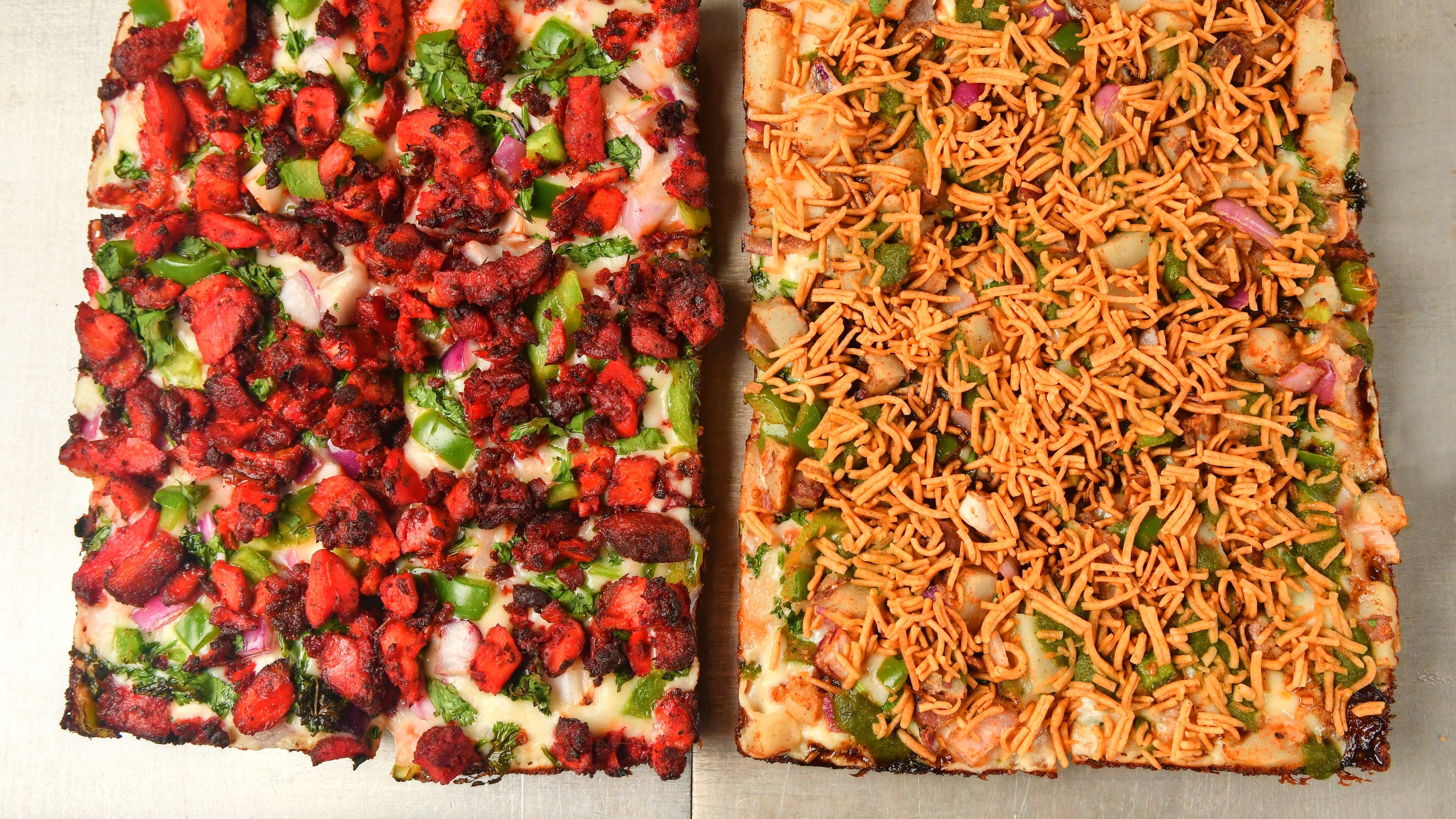 Rice N' Pie in Berkeley Lake offers the spicy flavors of India on pizza. Chris Hunt for The Atlanta Journal-Constitution.