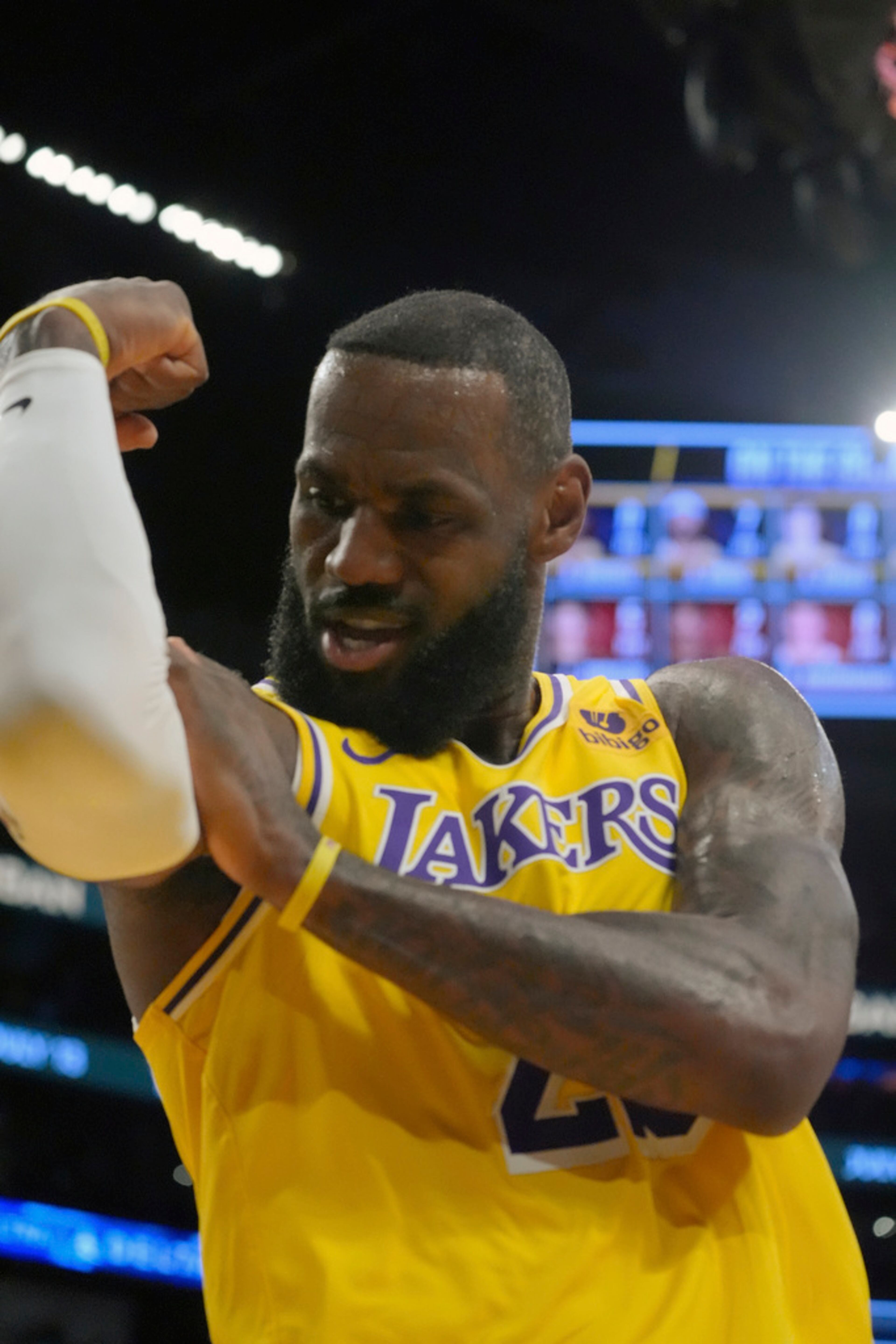 Los Angeles Lakers' LeBron James (23) celebrates after scoring against the Atlanta Hawks during the fist half of an NBA basketball game in Los Angeles Monday, March 18, 2024. (AP Photo/Damian Dovarganes)