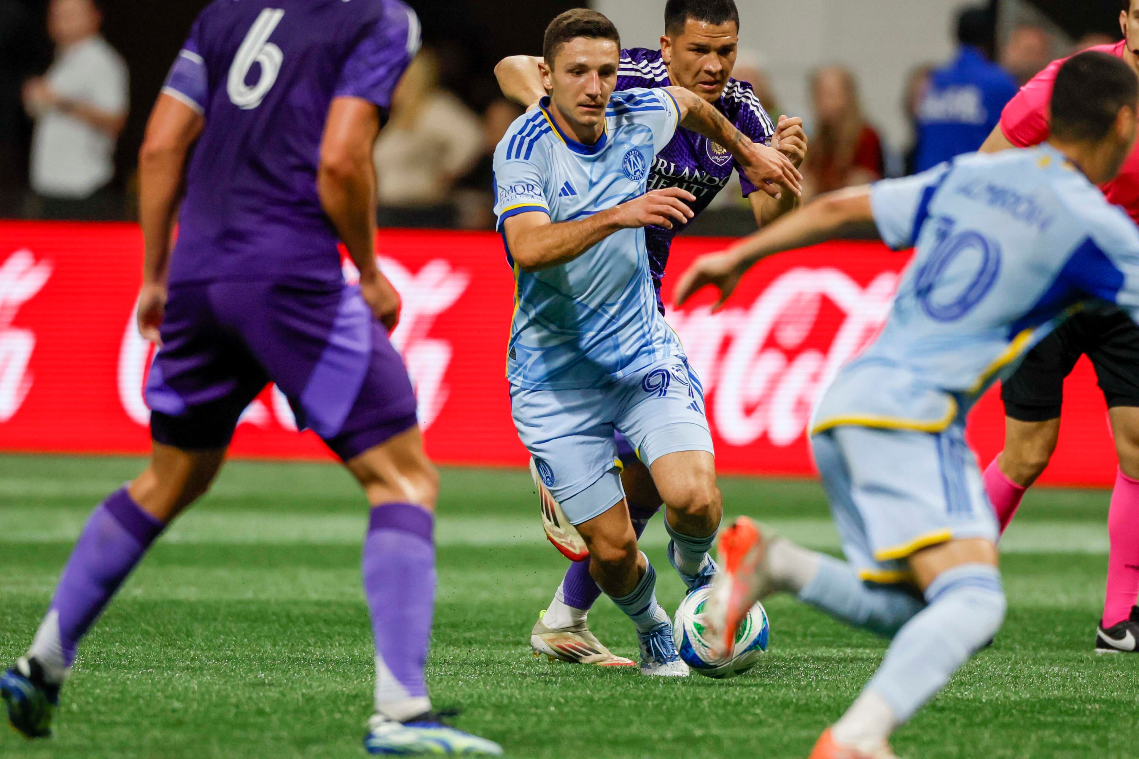 Atlanta United midfielder Bartosz Slisz (99) dribles in traffic during the first half against Orlando City at Mercedes-Benz Stadium on Wednesday, May 28, 2025, in Atlanta.
(Miguel Martinez/ AJC)