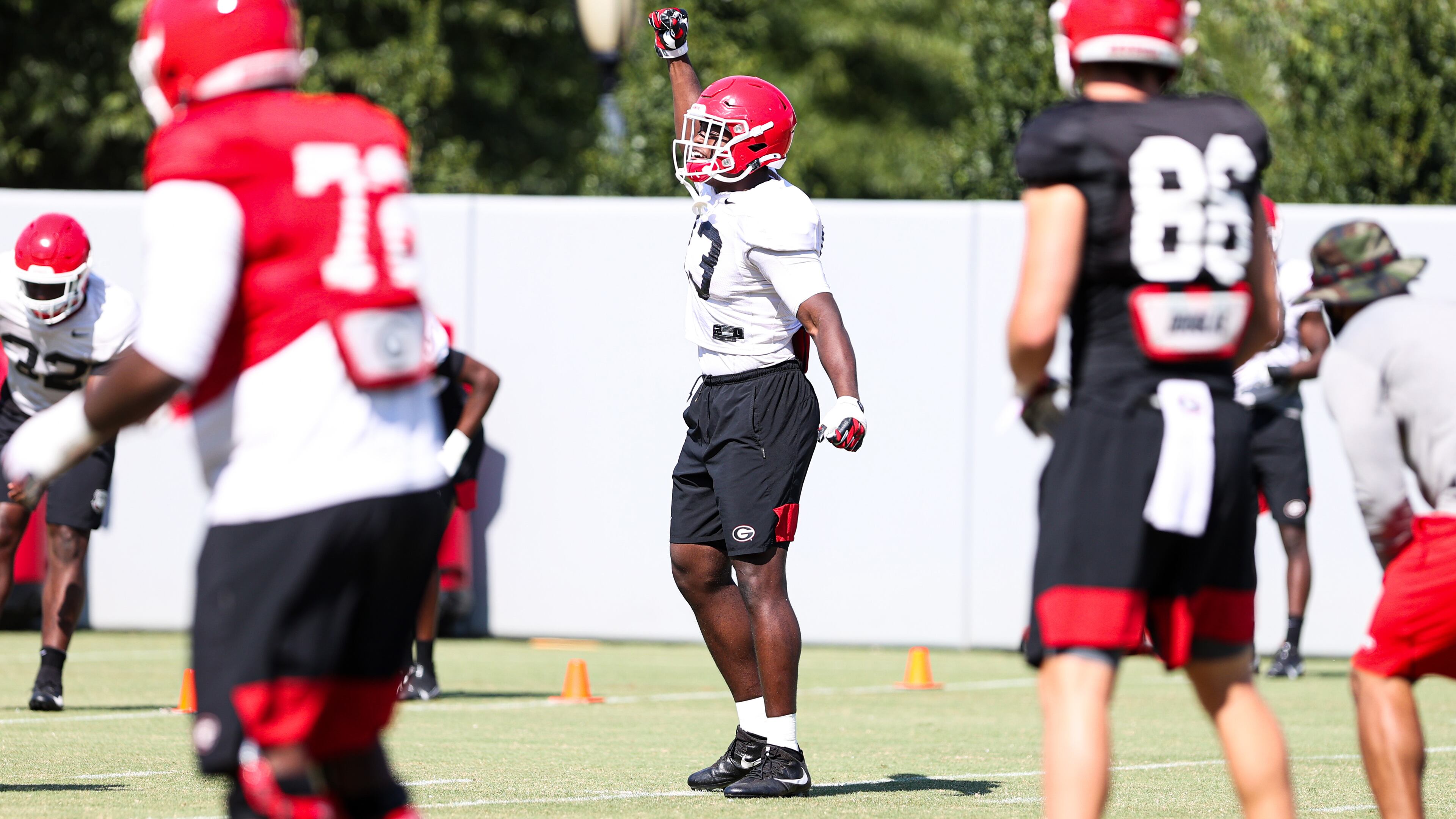 Georgia outside linebacker Azeez Ojulari (13) signals defense during the Bulldogs’ practice session Monday, Sept. 7, 2020, in Athens. (Tony Walsh/UGA Sports)