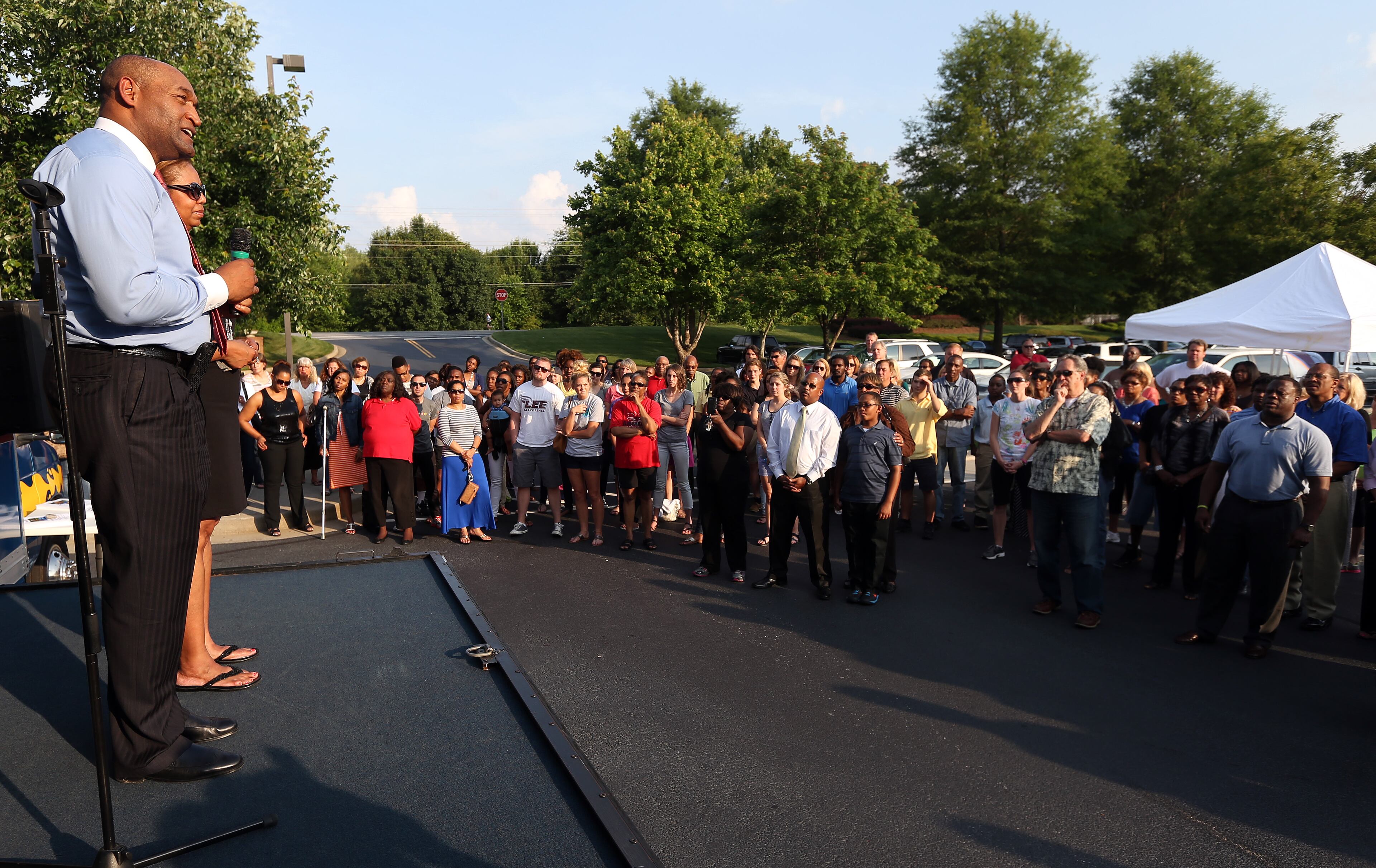 May 27, 2014 Roswell: Richard and Millicent Jones speak to a crowd of supporters at World Harvest Church in Roswell during a prayer vigil for the Jones son Ben who went missing after saying he was headed to pick up graduation tickets at Morehouse College. About two hundred friends, neighbors and fellow church members showed up for the Tuesday evening May 27, 2014 prayer vigil. BEN GRAY / BGRAY@AJC.COM
