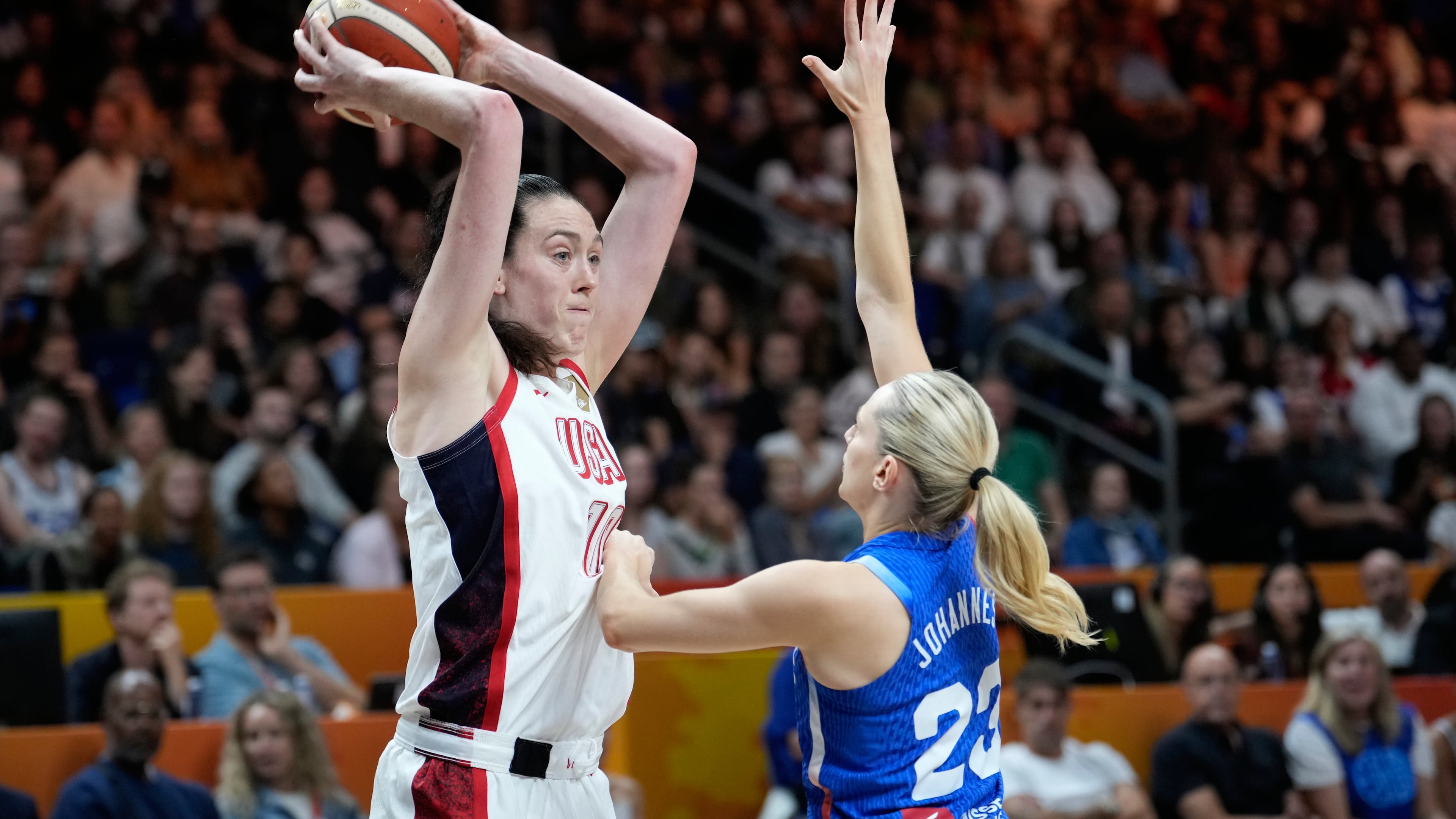 France's Marine Johannes guards Breanna Stewart, of the United States, during the Women's Basketball World Cup final match between the United States and France in Berlin, Sunday, Sept. 13, 2026. (AP Photo/Ebrahim Noroozi)
