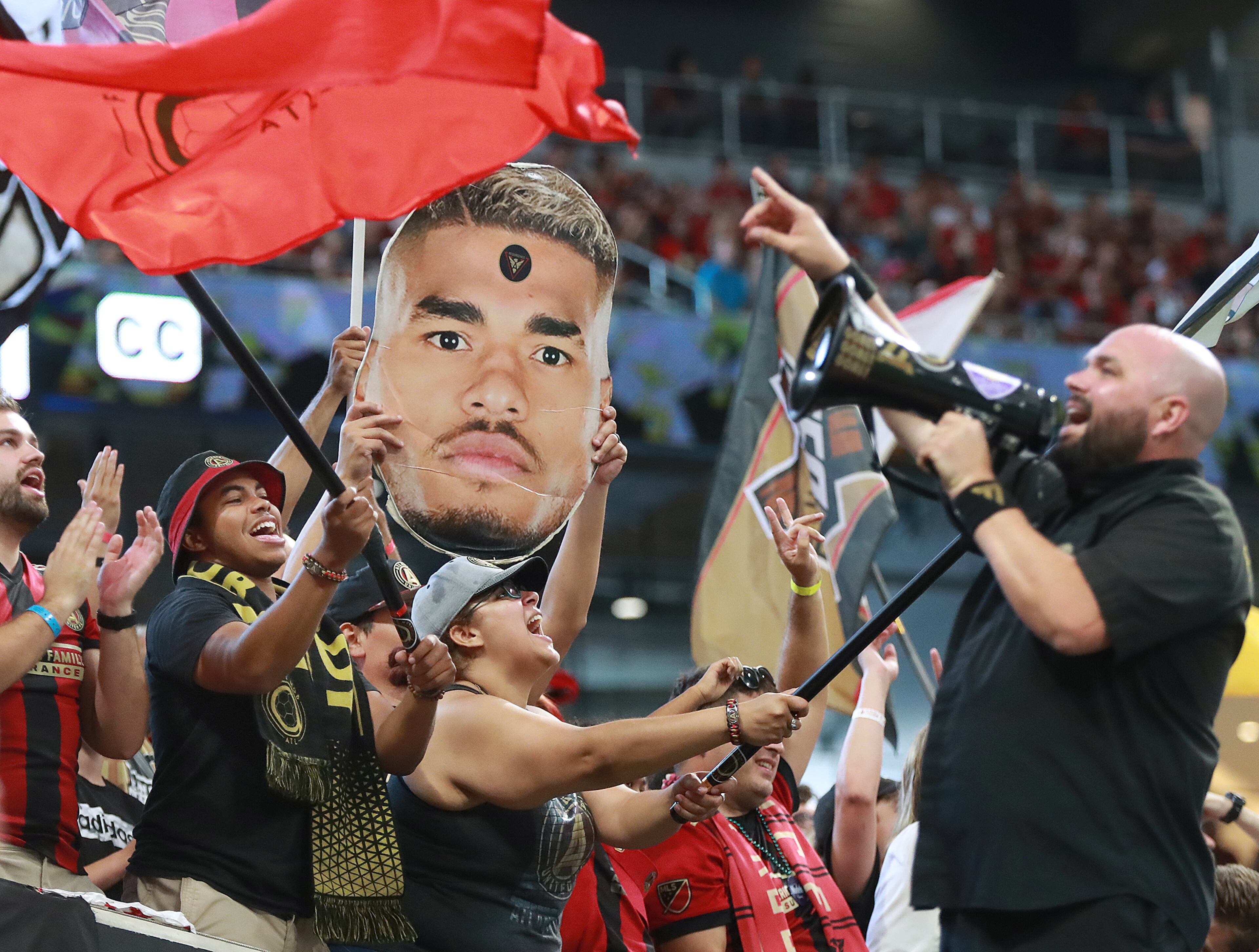 Atlanta United fans celebrate after forward Josef Martinez's goal that tied the MLS record for goals in a single season. Curtis Compton/ccompton@ajc.com