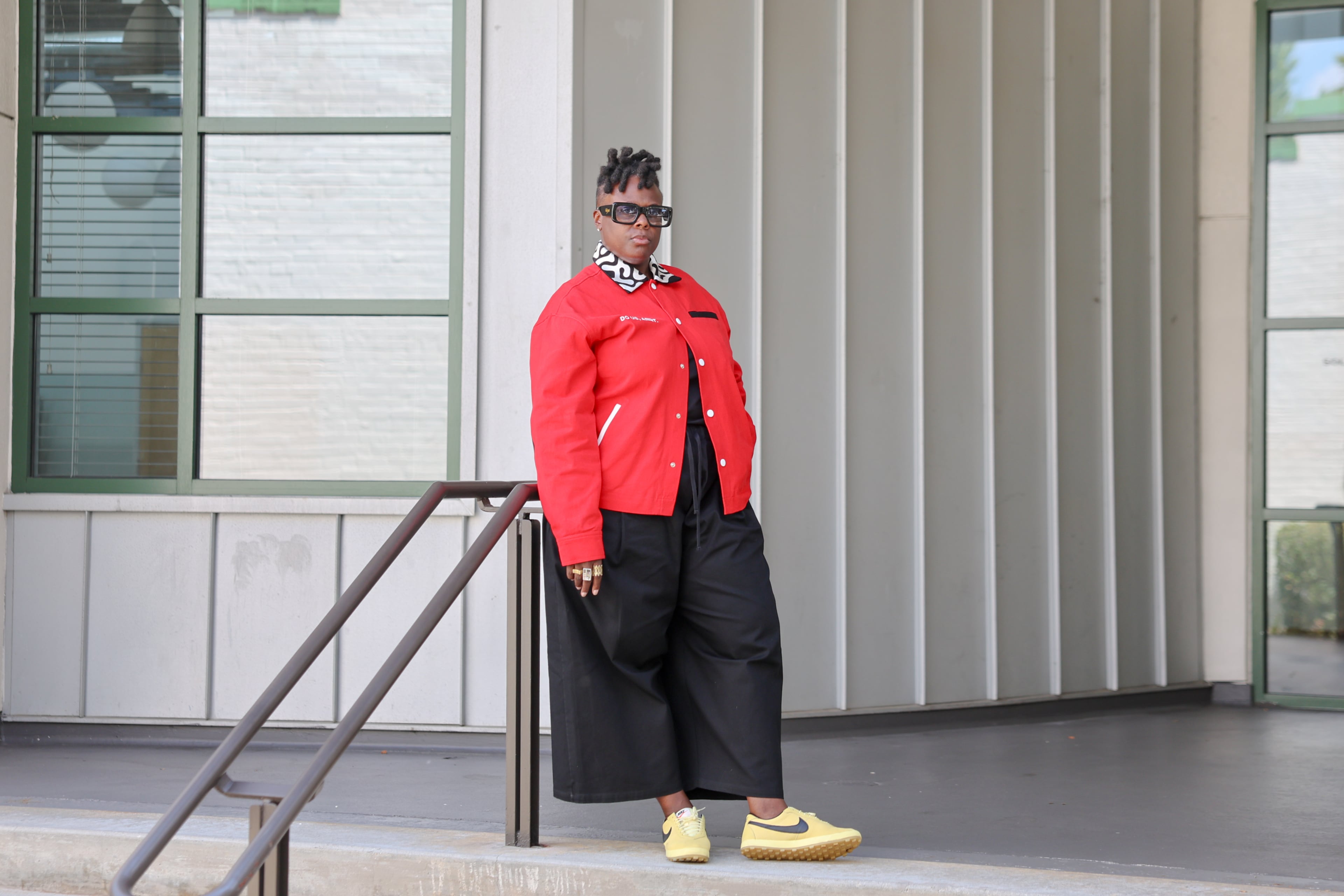 Third & Hayden founder Kei Henderson poses for a portrait outside her Live Nation office in Atlanta on Aug. 28, 2026. (Arvin Temkar/AJC)