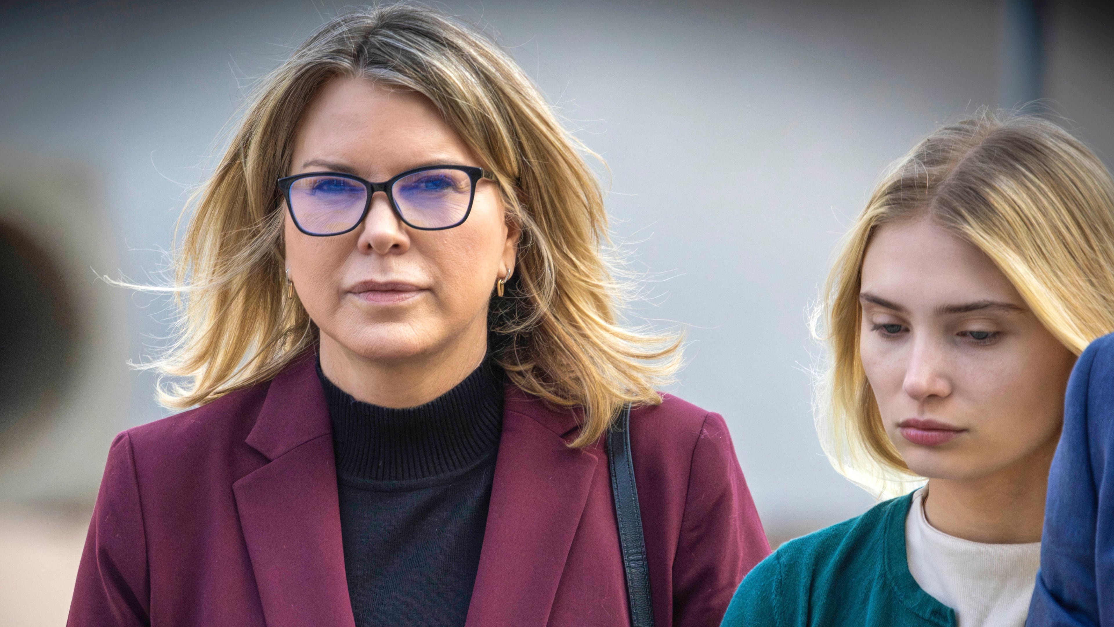 FILE - Rebecca Grossman, left, and her daughter head to Van Nuys Courthouse in the Van Nuys section of Los Angeles on Feb. 14, 2024. (Irfan Khan/Los Angeles Times via AP, FILE)