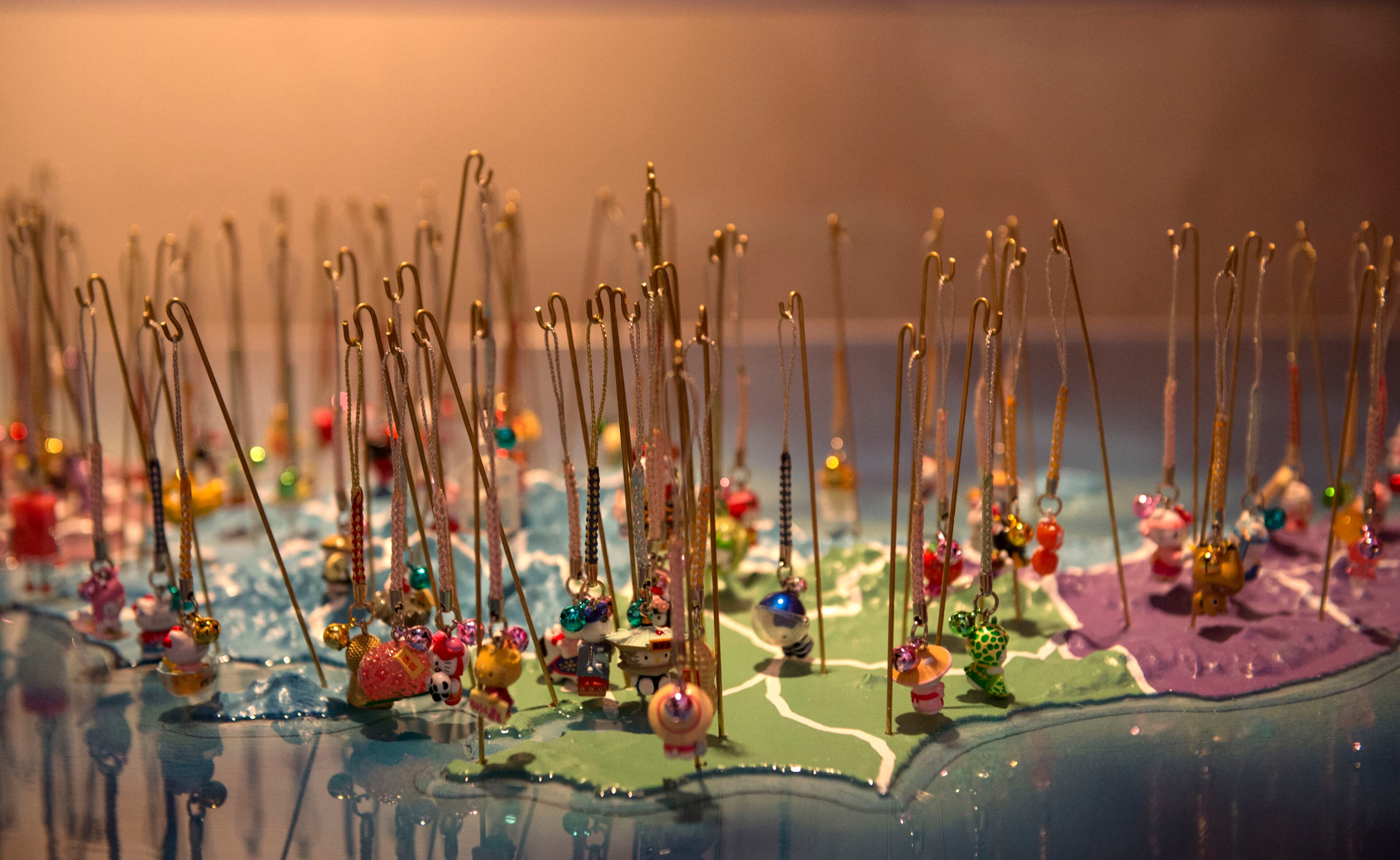 Hello Kitty items stand in a glass case one of many items on display at the Japanese American National Museum in Los Angeles on October 10, 2014. (Ed Crisostomo/Orange County Register/MCT)