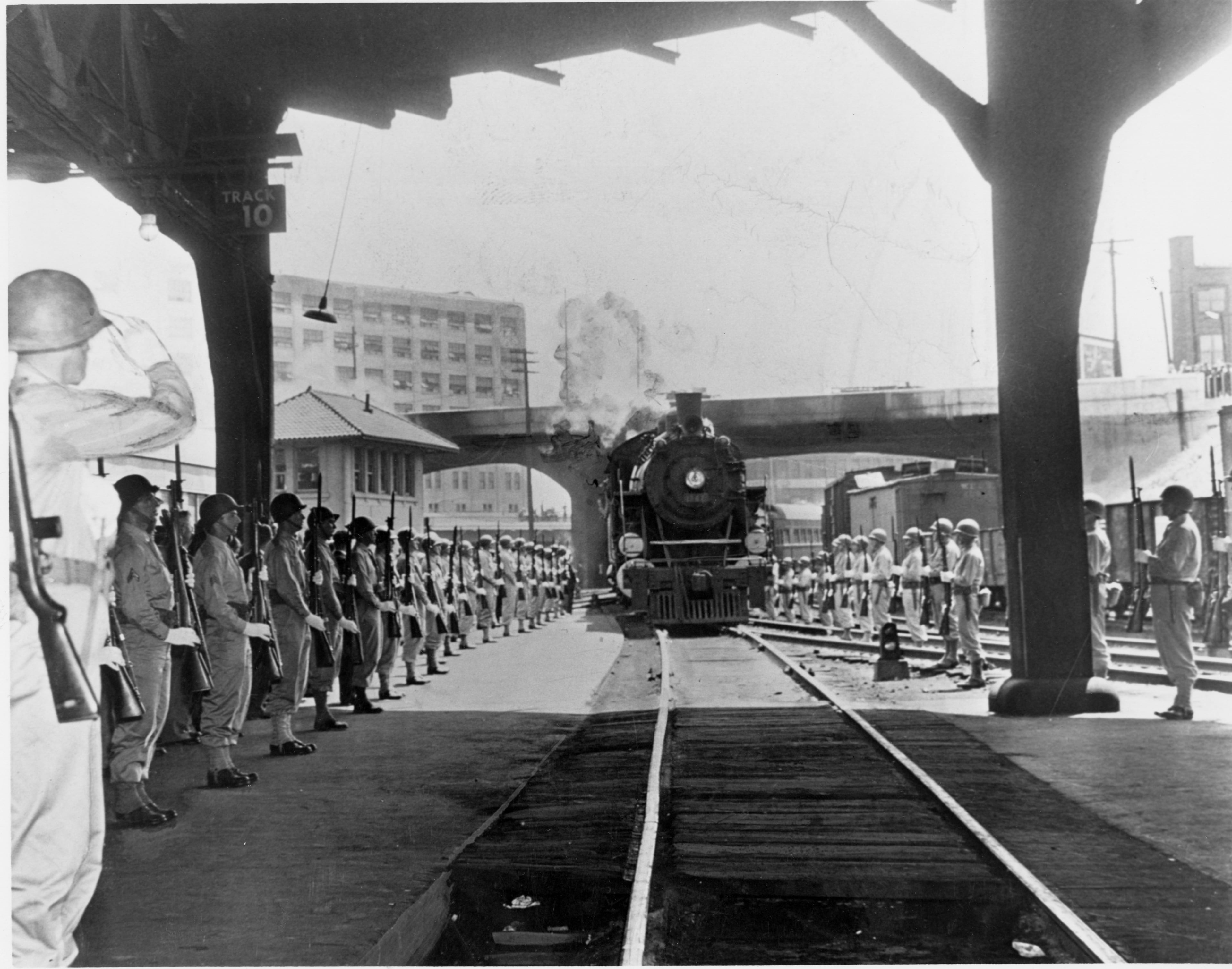 President Roosevelt's funeral train. An armed guard from Camp Sibert presents arms as the special train bearing the body of President Roosevelt pulls into the Terminal Station in April 1945 on it's way from Warm Springs, Ga. to Washington, D.C.
