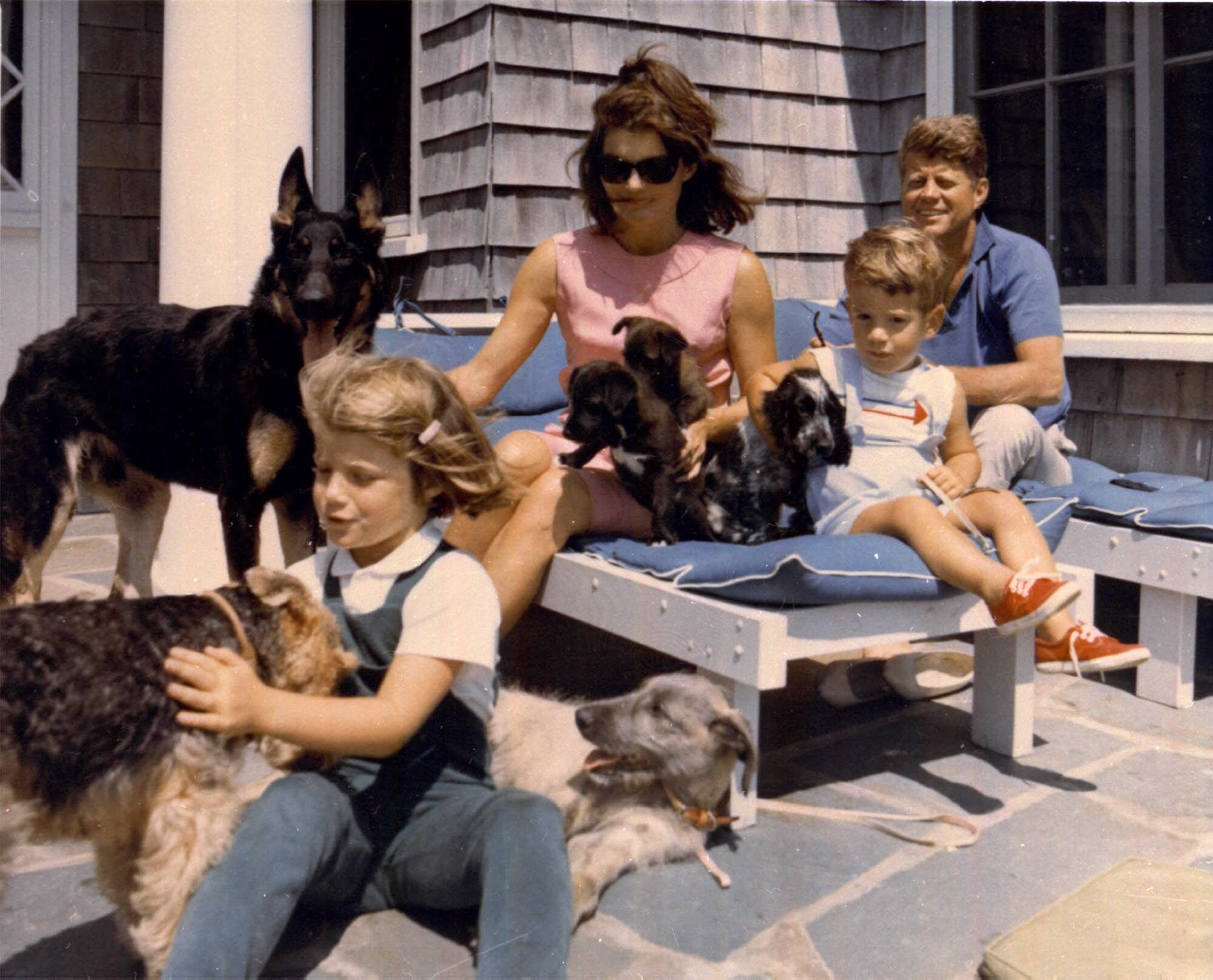 The family of President John F. Kennedy vacations in this undated file photo. From left: Caroline, first lady Jacqueline Kennedy, John Jr. and President Kennedy. - AP