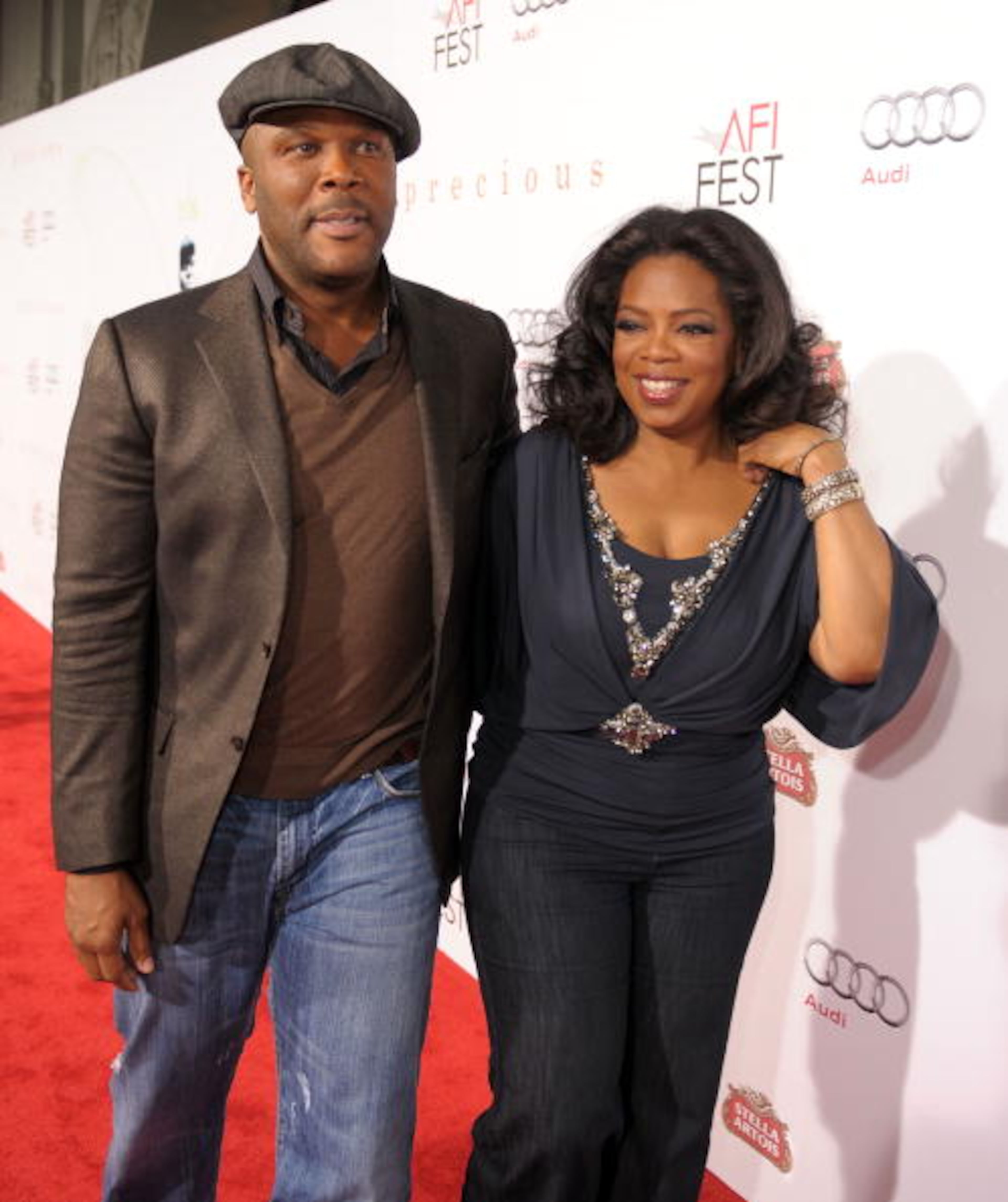 HOLLYWOOD - NOVEMBER 01: Director Tyler Perry (L) and Oprah Winfrey arrive at the screening of "Precious: Based On The Novel 'PUSH' By Sapphire" during AFI FEST 2009 held at Grauman's Chinese Theatre on November 1, 2009 in Hollywood, California. (Photo by Kevin Winter/Getty Images for AFI)