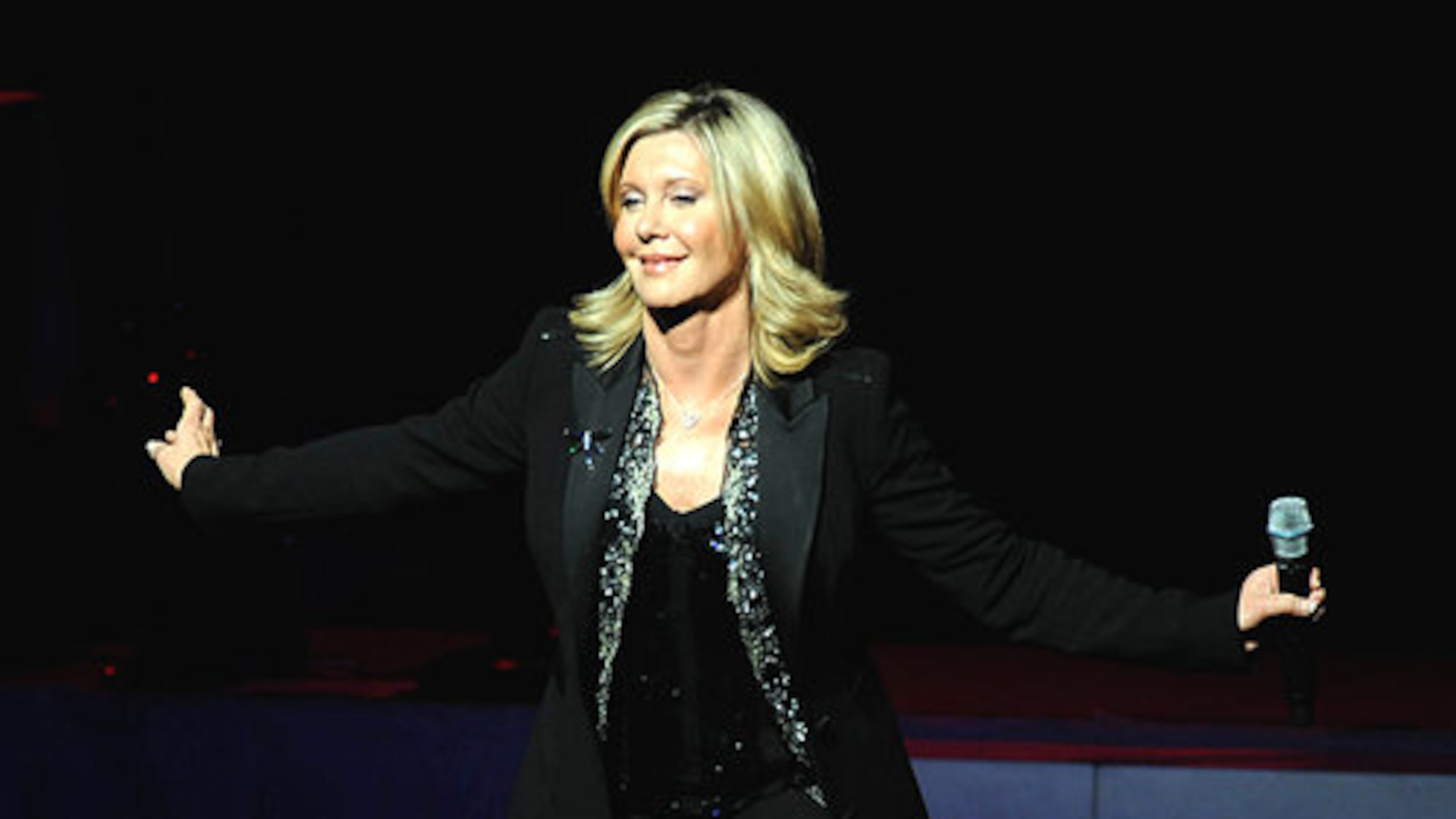 Olivia Newton-John was appointed as an Officer of the Order of Australia by Queen Elizabeth for her philanthropic work with organizations supporting the environment and breast cancer research. Newton-John was born in Cambridge, England, but grew up in Australia. (AJC File)