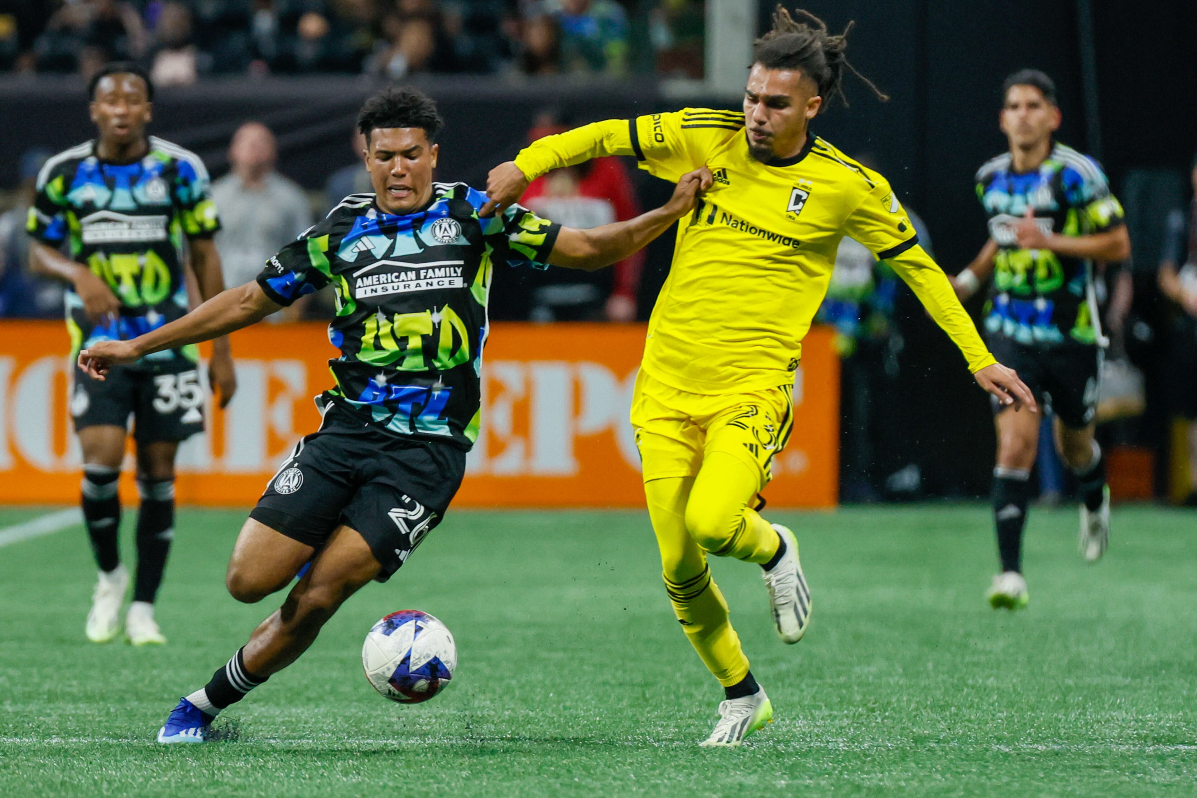 Atlanta United defender Caleb Wiley (26) battles for possession against Columbus Crew defender Mohamed Farsi (23) during the second half against Columbus Crew in Game 2 of a first-round MLS playoff game at Mercedes-Benz Stadium on Tuesday, Nov. 7, 2023.
Miguel Martinez / miguel.martinezjimenez@ajc.com