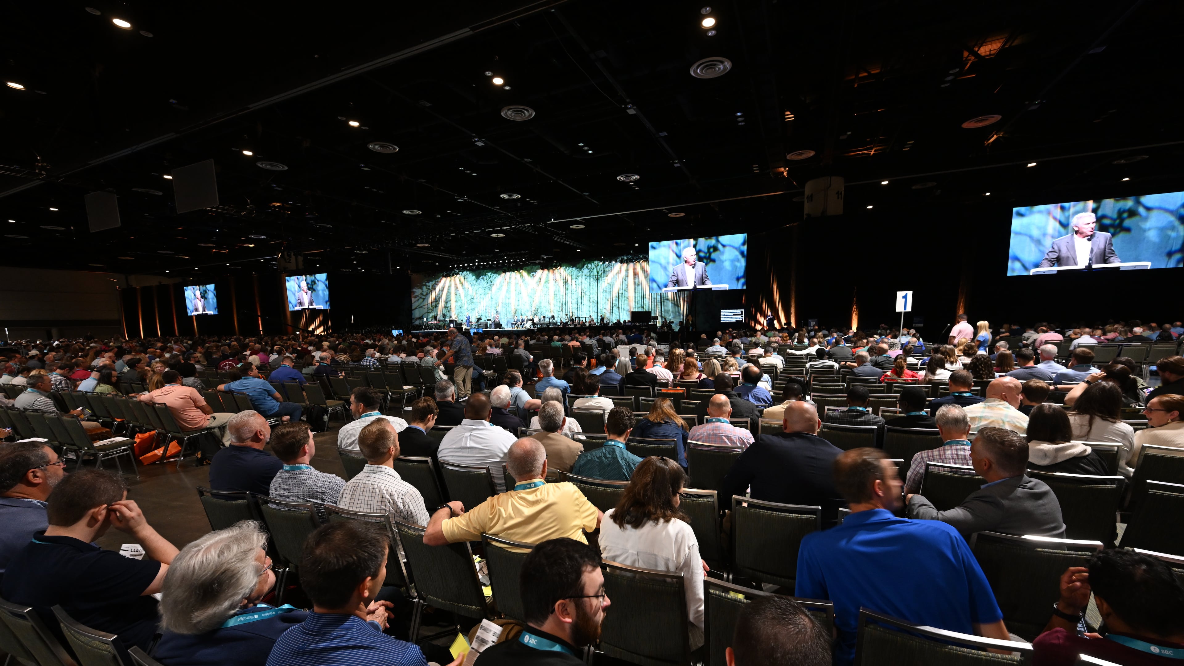 FILE - Attendees listen to a presentation during the annual meeting of the Southern Baptist Convention, Tuesday, June 9, 2026, in Orlando, Fla. (AP Photo/Phelan M. Ebenhack, File)