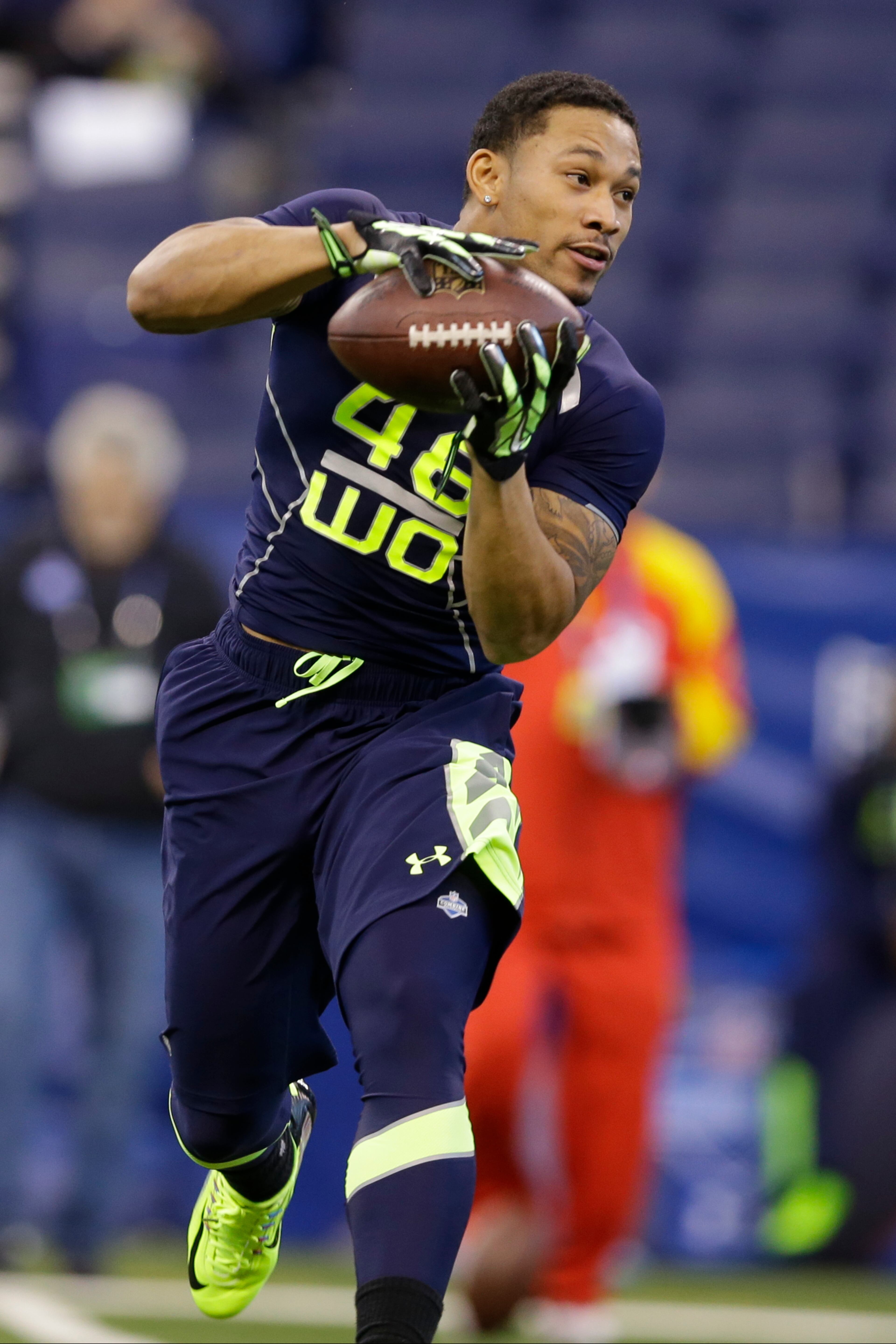 Georgia State wide receiver Albert Wilson makes a catch during a drill at the NFL football scouting combine in Indianapolis, Sunday, Feb. 23, 2014. (AP Photo/Michael Conroy)
