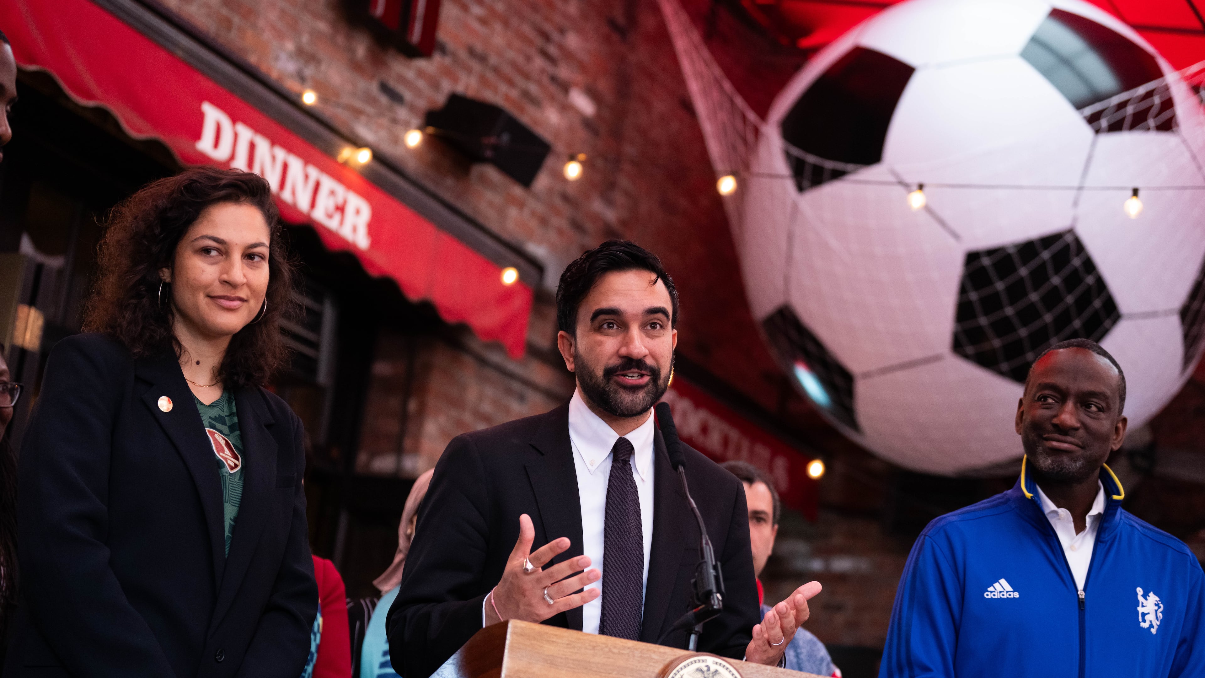 New York Mayor Zohran Mamdani, alongside NYC World Cup Czar Maya Handa, NYC World Cup Czar, left, and New York council member Yusef Salaam, makes a World Cup soccer tournament announcement at Harlem Tavern, Thursday, May 21, 2026 in New York. (AP Photo/Adam Gray)