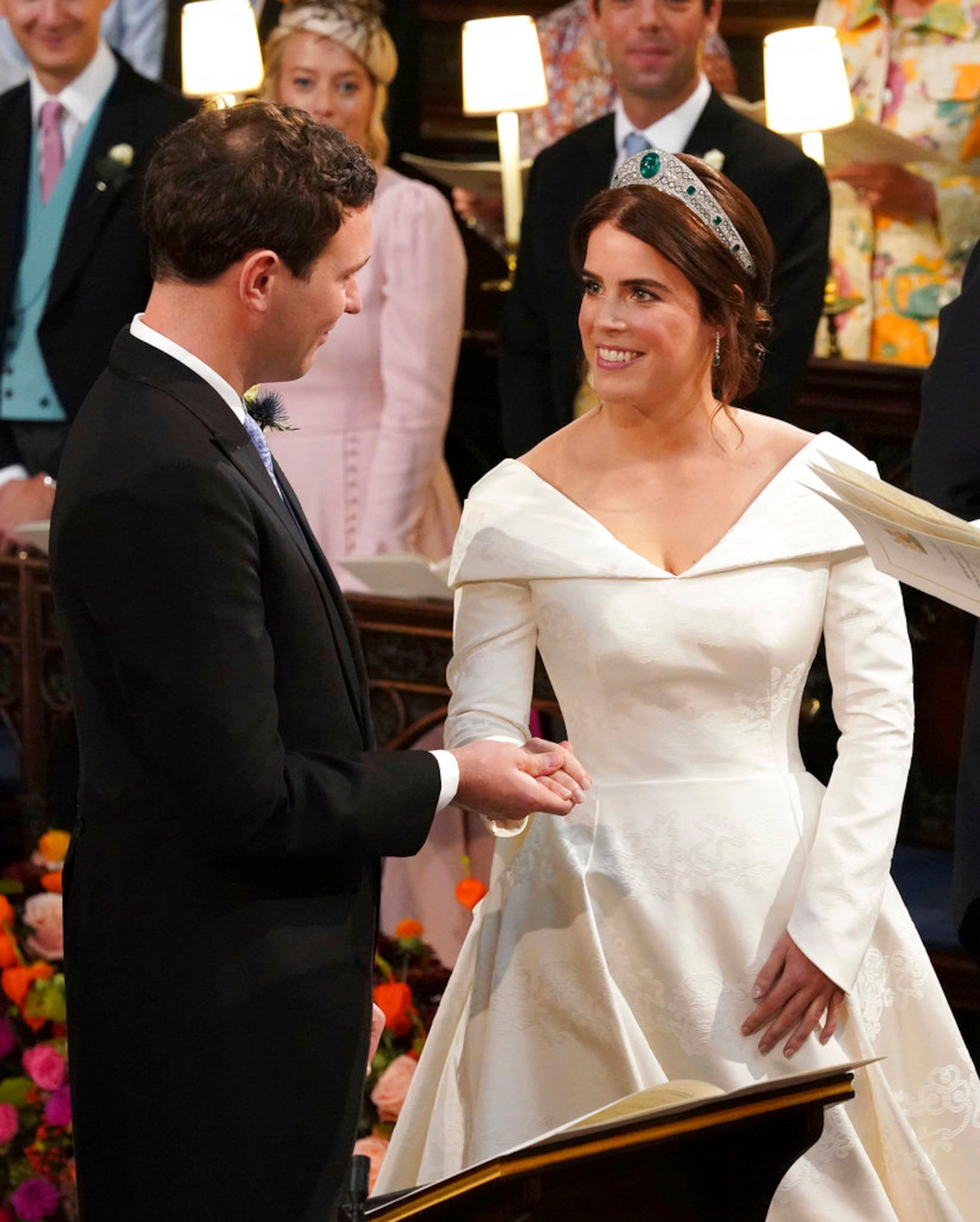 The Rt Revd David Conner, Dean of Windsor conducts the wedding ceremony between Princess Eugenie of York and Jack Brooksbank in St Georgeâs Chapel, Windsor Castle, near London, England, Friday Oct. 12, 2018. (Jonathan Brady, Pool via AP)